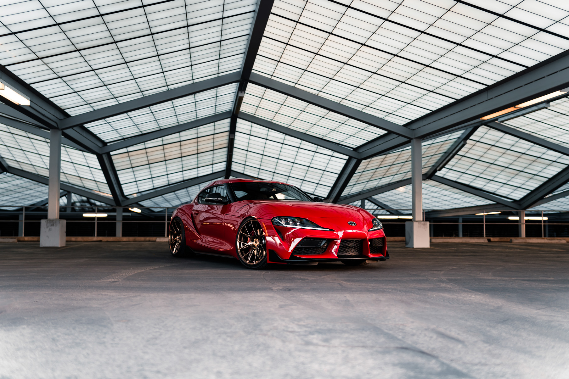A 2020 Toyota Supra on Blaque Diamond BD-F18 Polished Bronze Little Tokyo Wheels