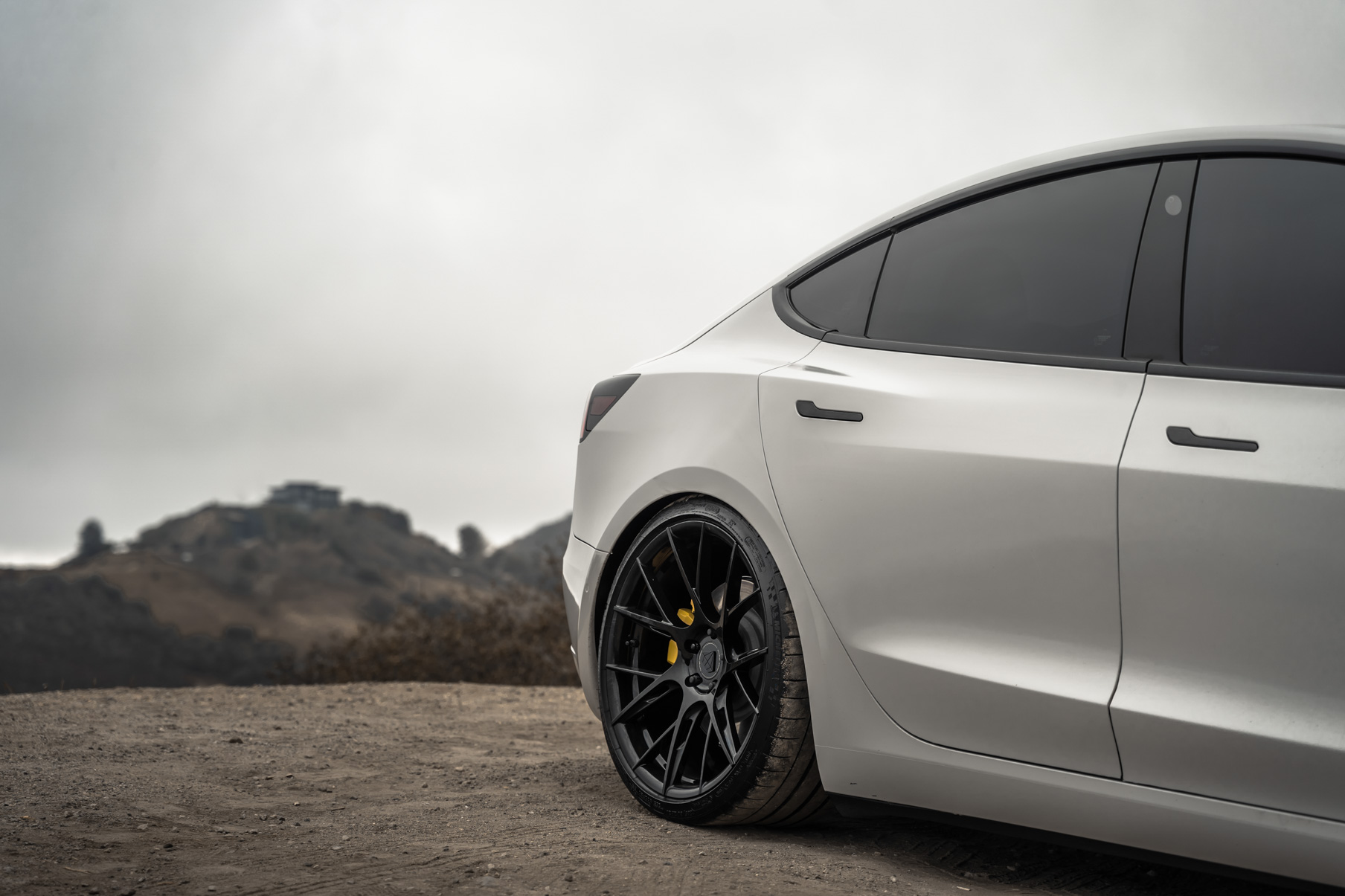 A 2020 Tesla Model 3 on 20 Inch Blaque Diamond BD-F18 Gloss Black Wheels