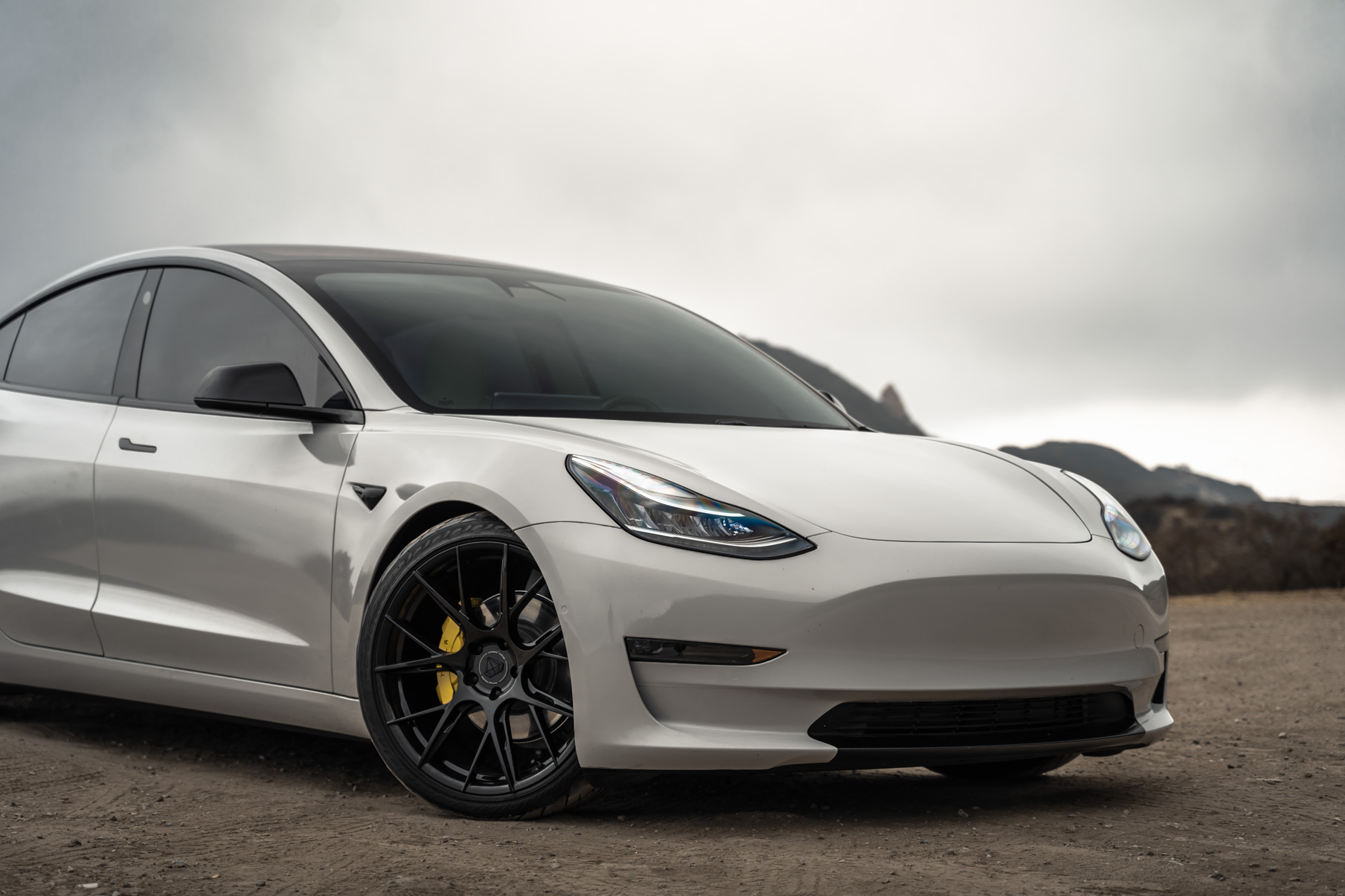 A 2020 Tesla Model 3 on 20 Inch Blaque Diamond BD-F18 Gloss Black Wheels