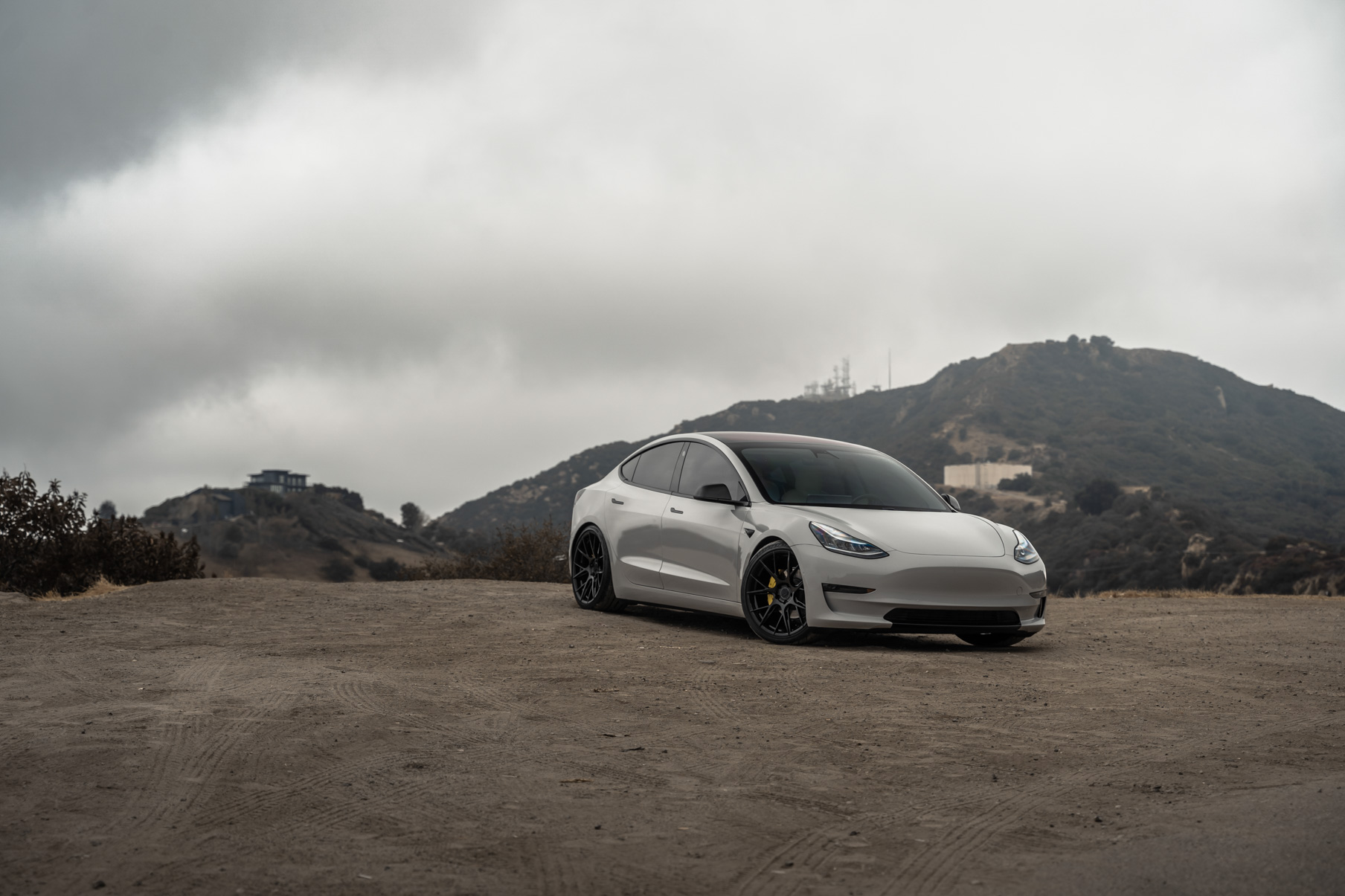 A 2020 Tesla Model 3 on 20 Inch Blaque Diamond BD-F18 Gloss Black Wheels