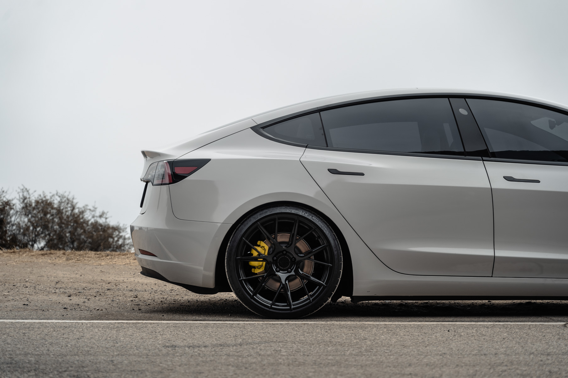 A 2020 Tesla Model 3 on 20 Inch Blaque Diamond BD-F18 Gloss Black Wheels