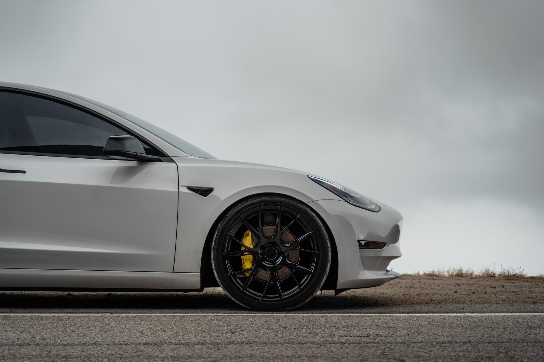 A 2020 Tesla Model 3 on 20 Inch Blaque Diamond BD-F18 Gloss Black Wheels