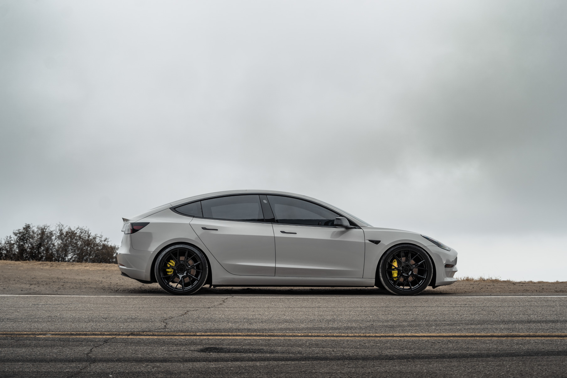 A 2020 Tesla Model 3 on 20 Inch Blaque Diamond BD-F18 Gloss Black Wheels