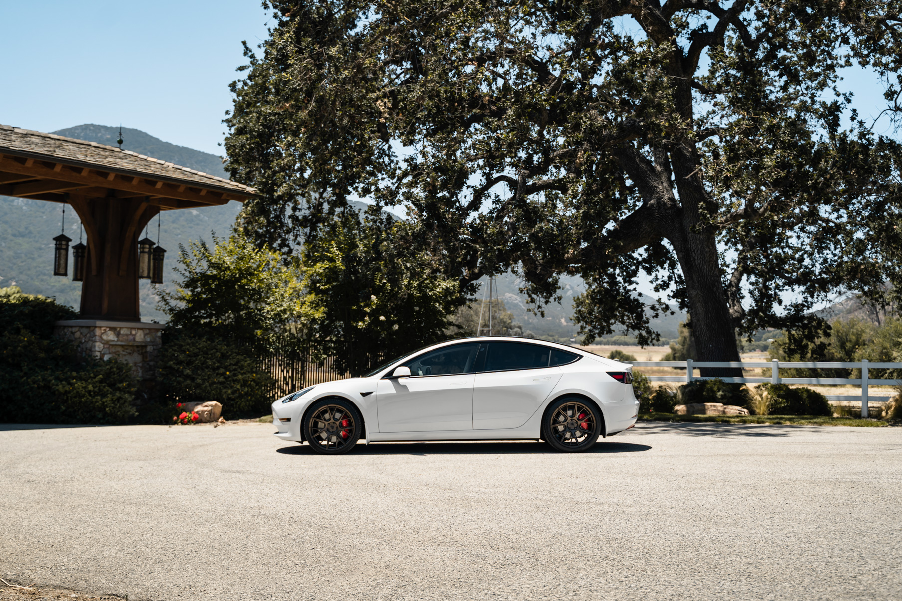 A 2019 Tesla Model 3 on 20 Inch Blaque Diamond BD-F18 Antique Matte Bronze Wheels