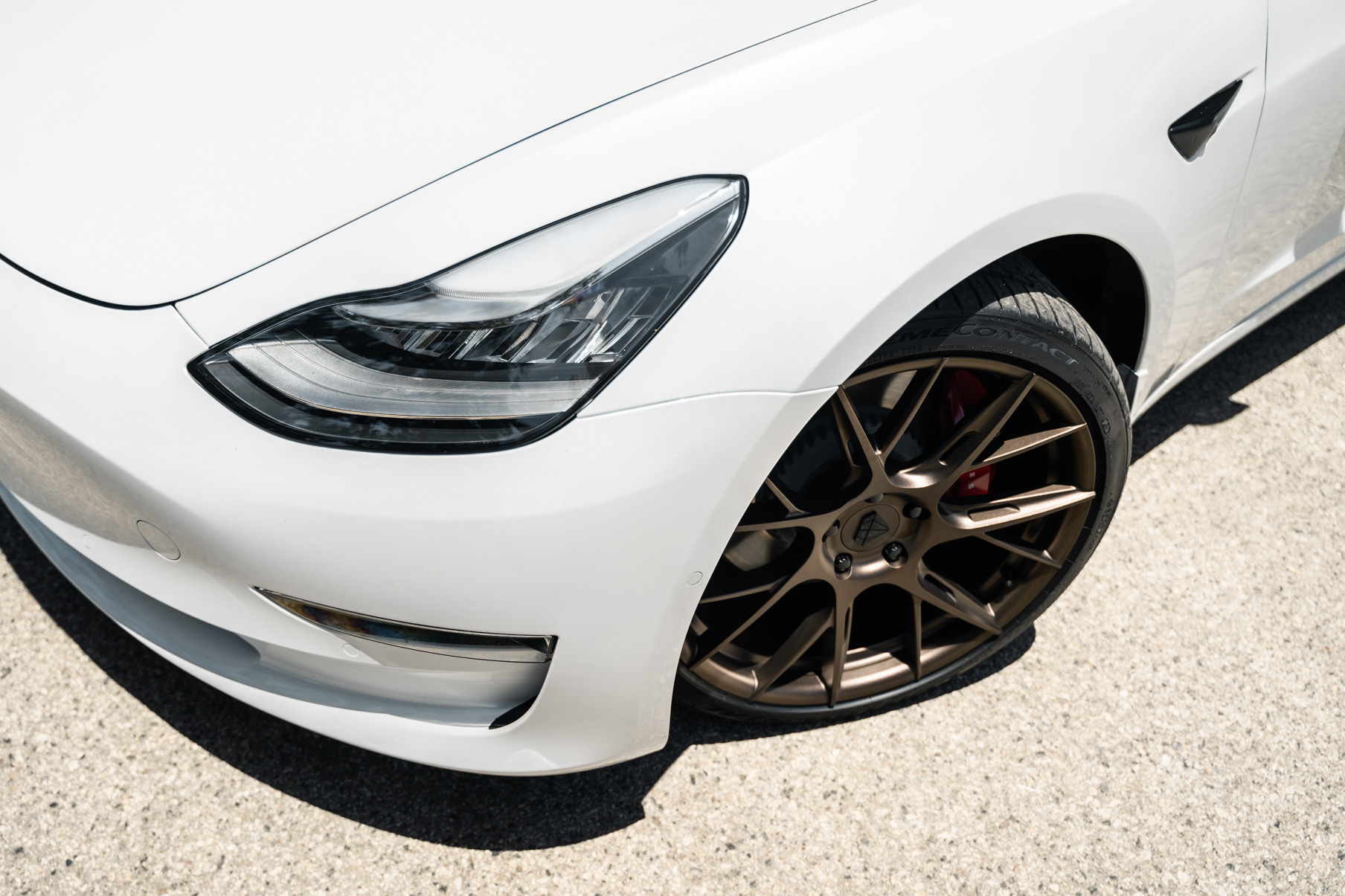 A 2019 Tesla Model 3 on 20 Inch Blaque Diamond BD-F18 Antique Matte Bronze Wheels