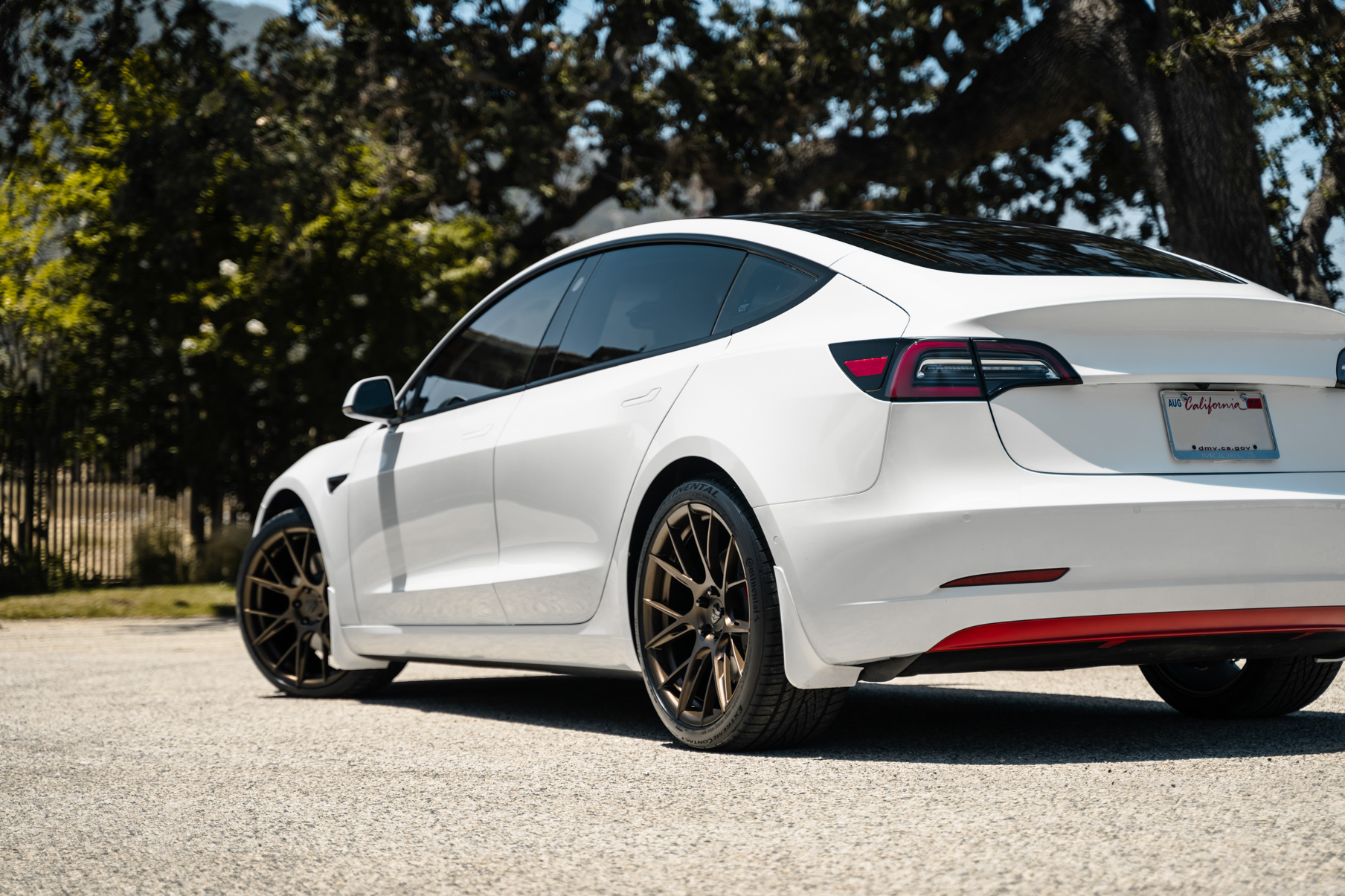 A 2019 Tesla Model 3 on 20 Inch Blaque Diamond BD-F18 Antique Matte Bronze Wheels