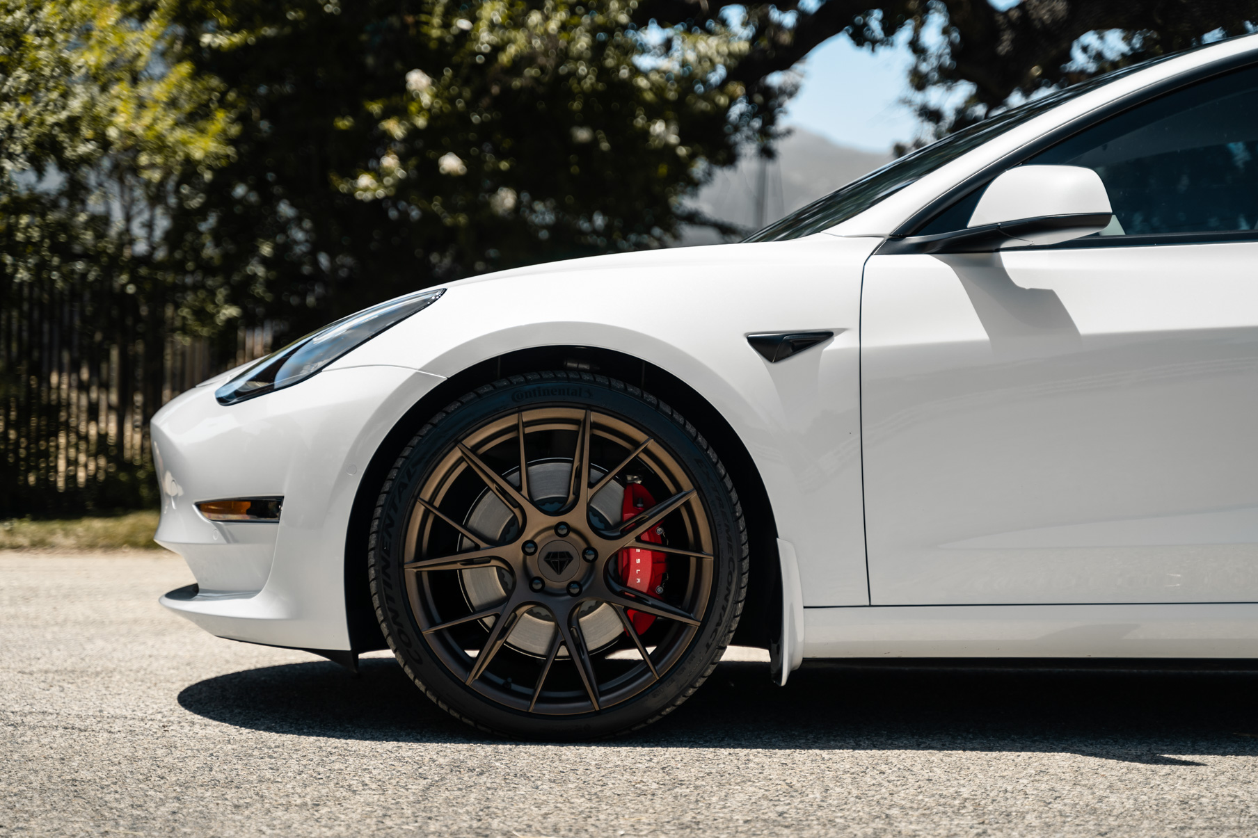 A 2019 Tesla Model 3 on 20 Inch Blaque Diamond BD-F18 Antique Matte Bronze Wheels