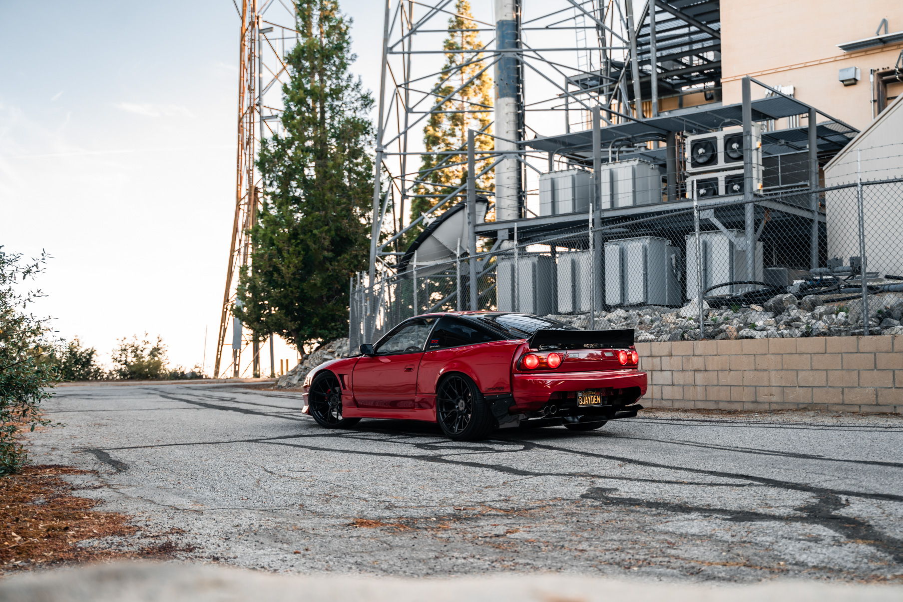 A 1991 Nissan 240SX on Blaque Diamond BD-F18 Gloss Black Wheels
