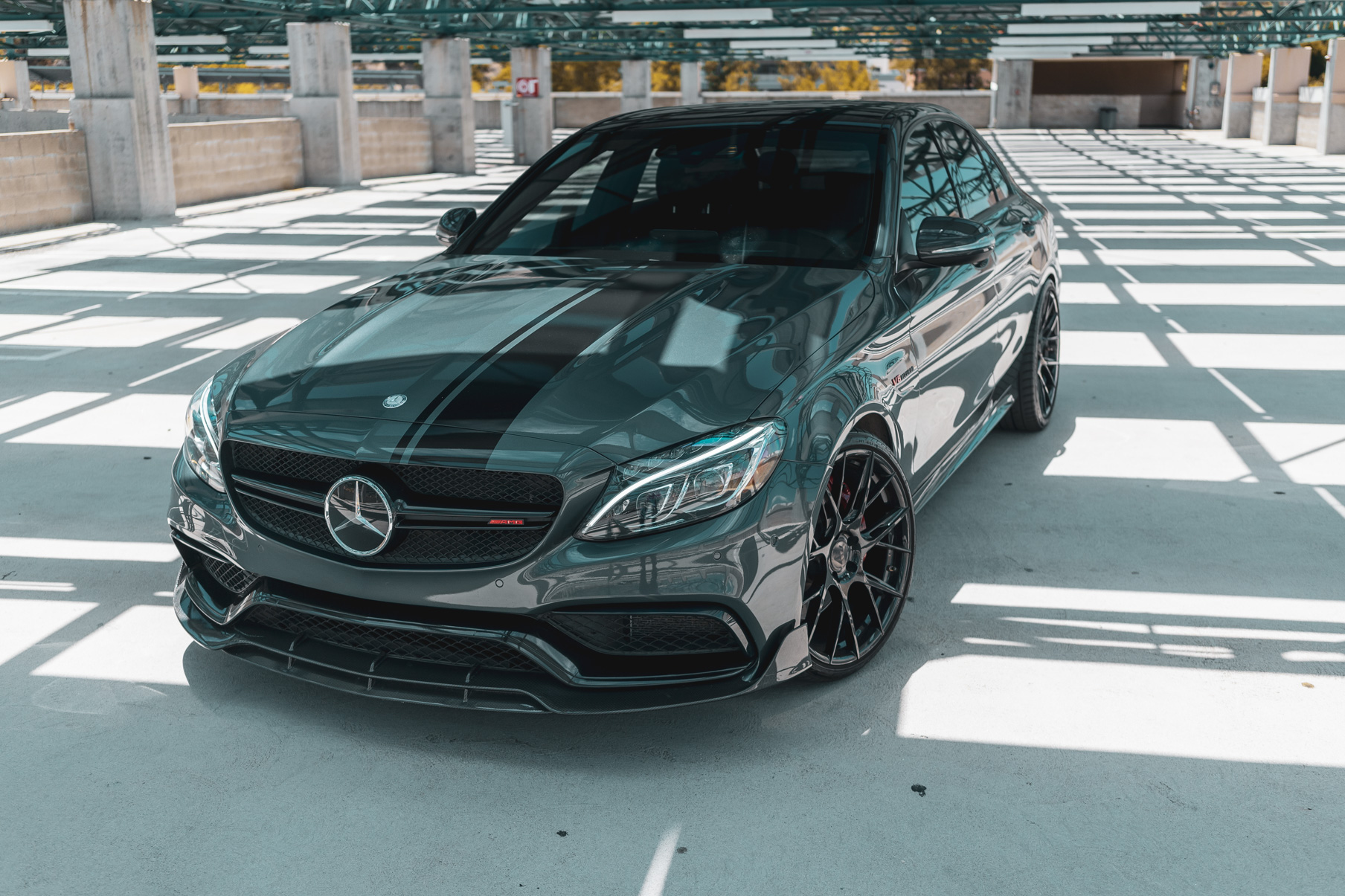 A 2018 Mercedes-Benz C63 on 20 Inch Blaque Diamond BD-F18 Gloss Black Wheels