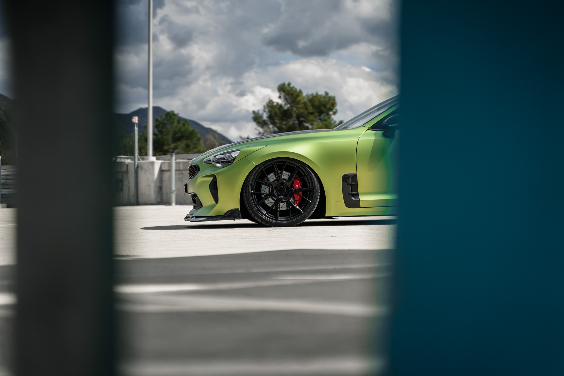 A 2019 Bagged Kia Stinger GT on 20 Inch Blaque Diamond BD-F18 Gloss Black Wheels