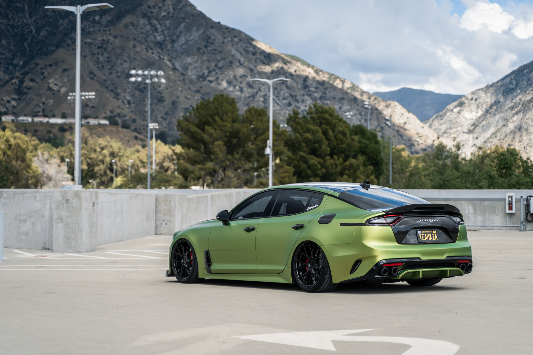 A 2019 Bagged Kia Stinger GT on 20 Inch Blaque Diamond BD-F18 Gloss Black Wheels