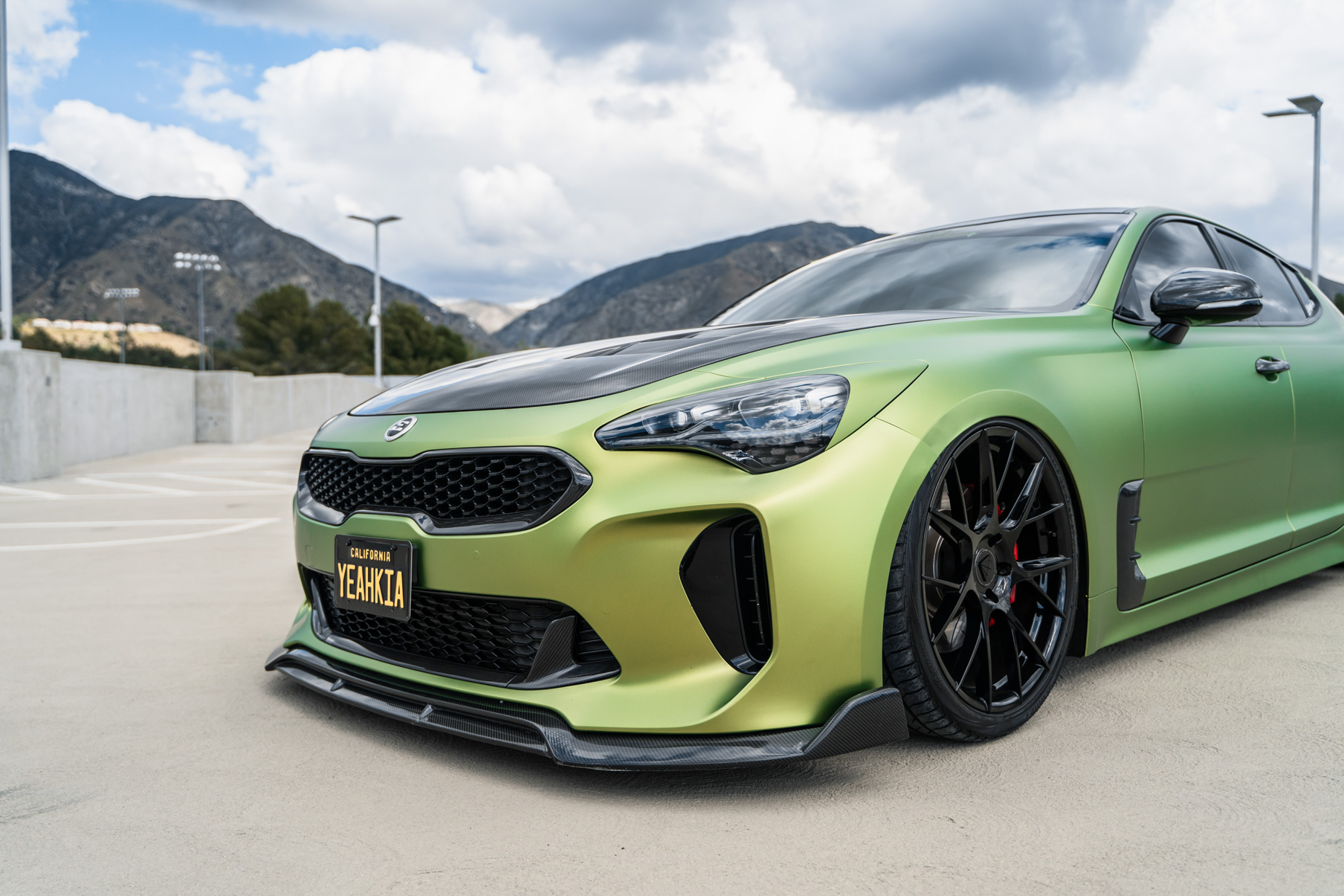 A 2019 Bagged Kia Stinger GT on 20 Inch Blaque Diamond BD-F18 Gloss Black Wheels