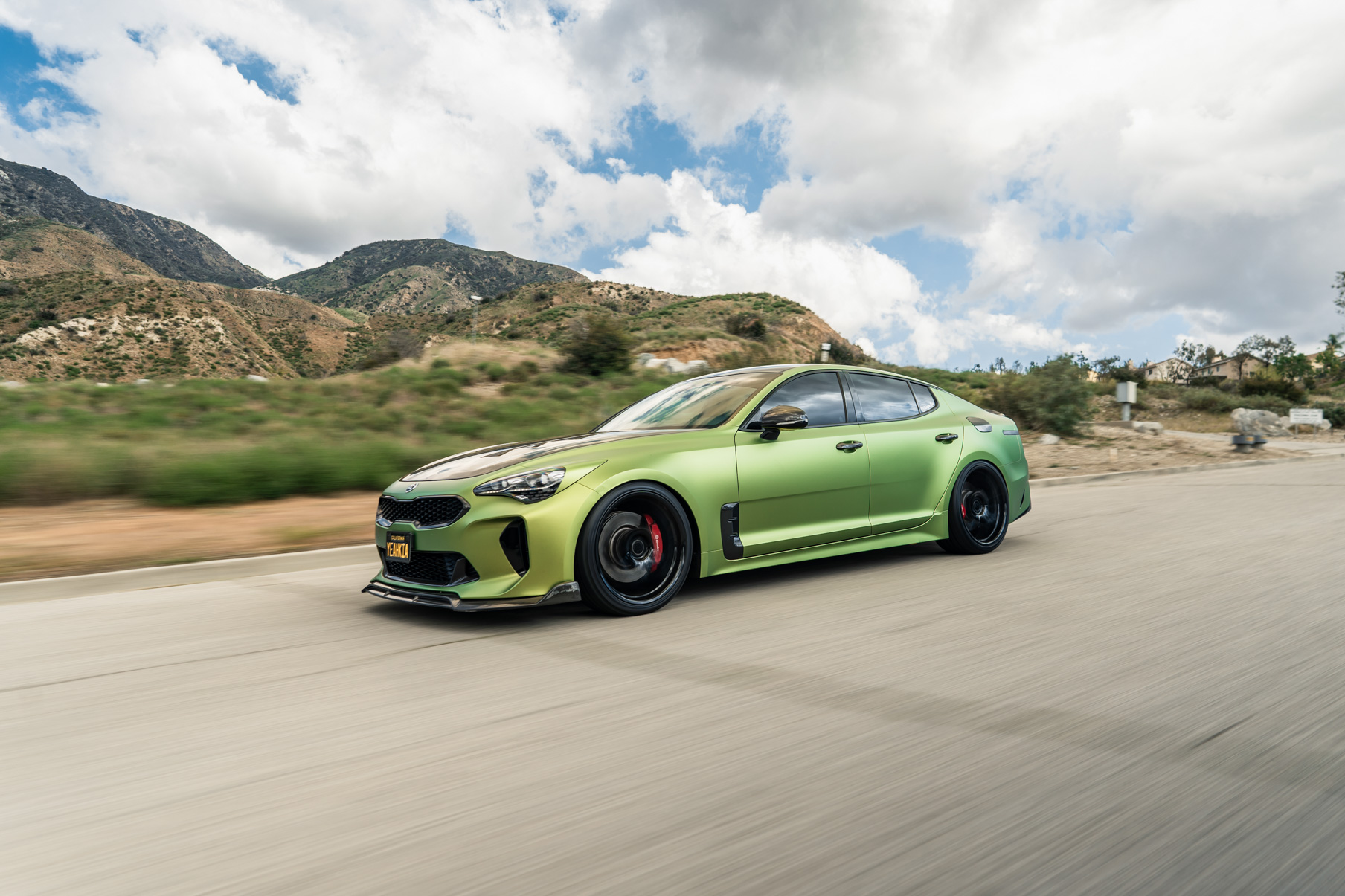 A 2019 Bagged Kia Stinger GT on 20 Inch Blaque Diamond BD-F18 Gloss Black Wheels