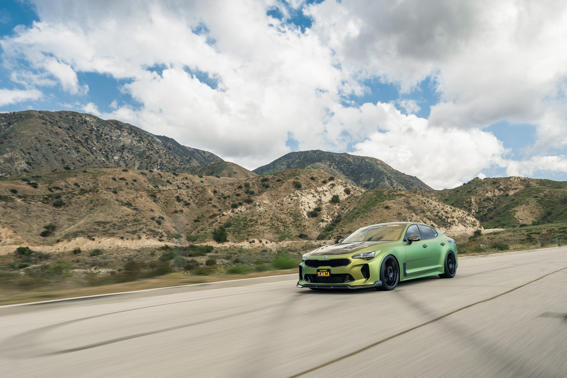 A 2019 Bagged Kia Stinger GT on 20 Inch Blaque Diamond BD-F18 Gloss Black Wheels