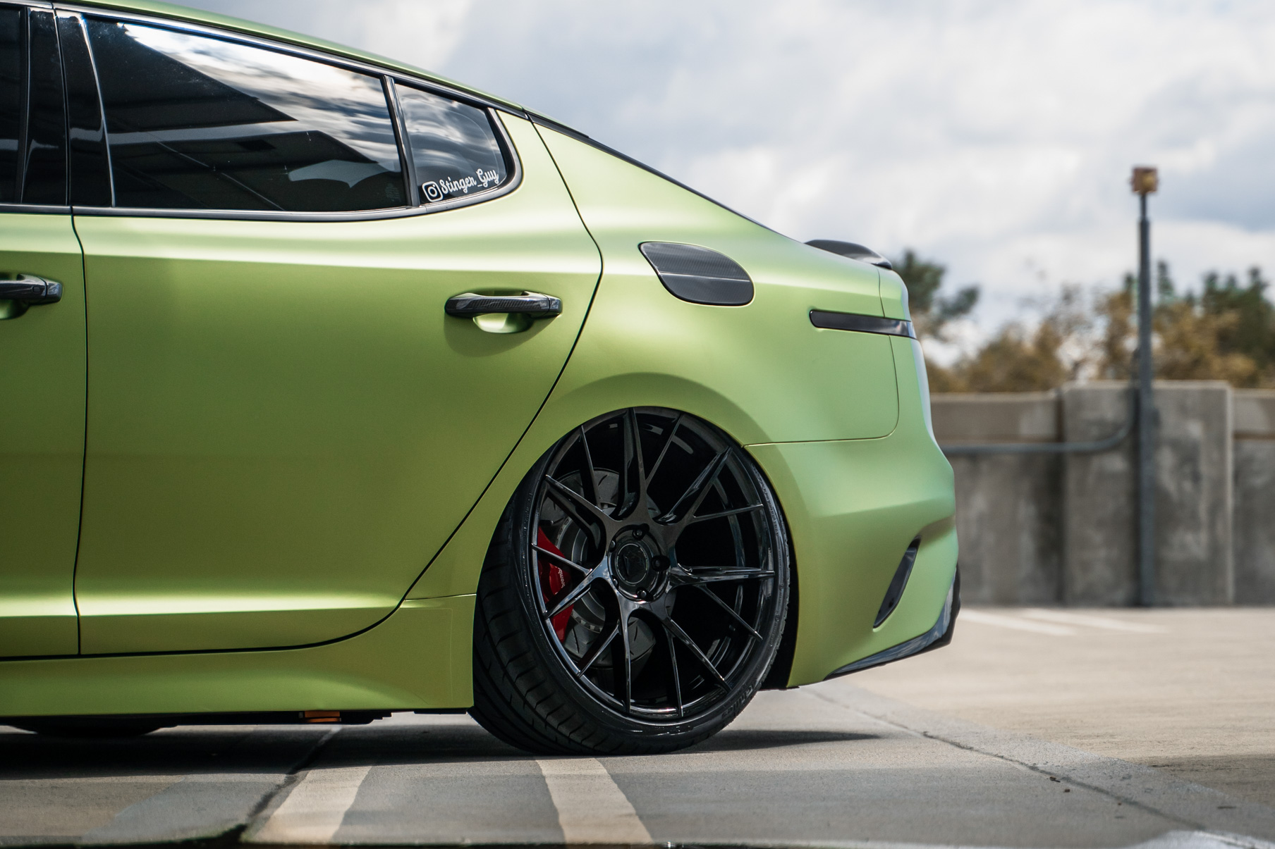 A 2019 Bagged Kia Stinger GT on 20 Inch Blaque Diamond BD-F18 Gloss Black Wheels