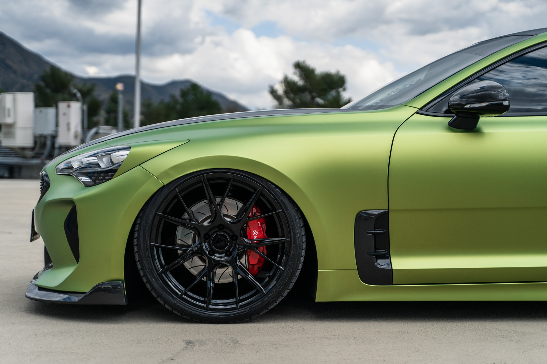A 2019 Bagged Kia Stinger GT on 20 Inch Blaque Diamond BD-F18 Gloss Black Wheels