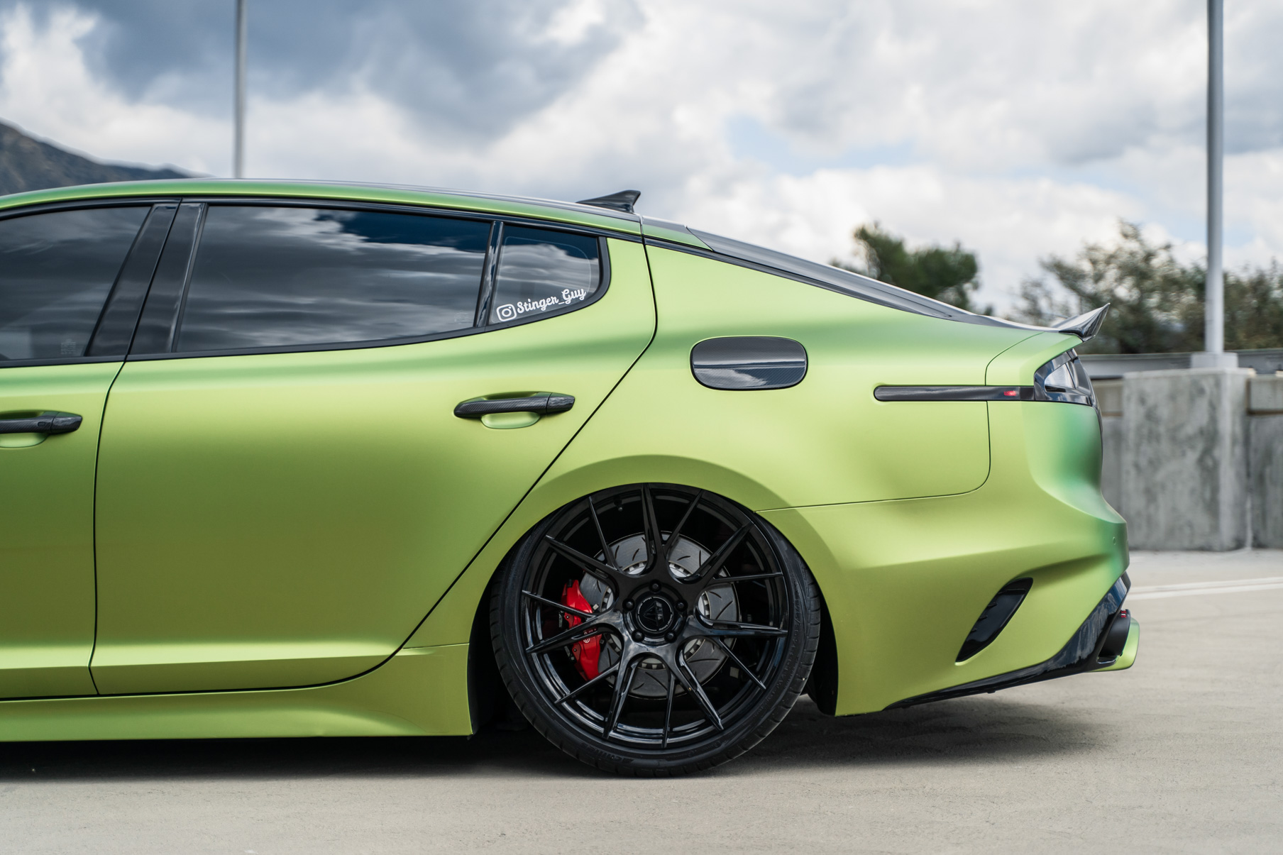 A 2019 Bagged Kia Stinger GT on 20 Inch Blaque Diamond BD-F18 Gloss Black Wheels