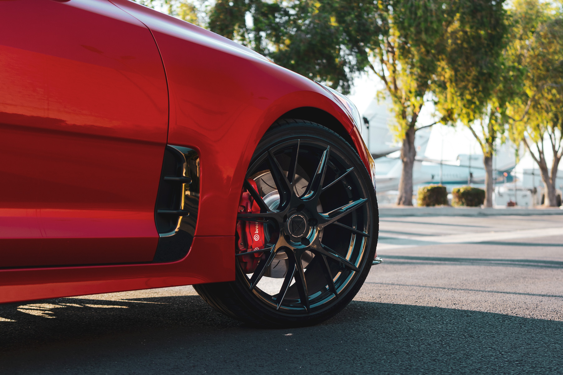 A 2018 Kia Stinger GT on Blaque Diamond BD-F18 Gloss Black Wheels