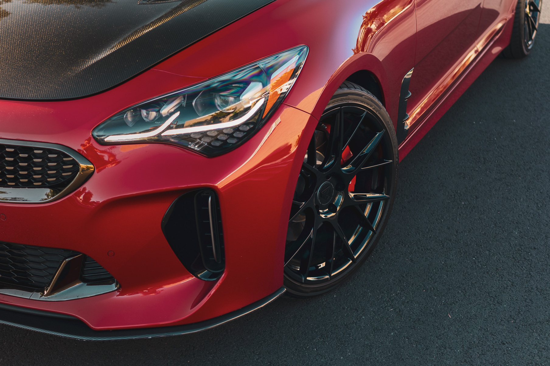 A 2018 Kia Stinger GT on Blaque Diamond BD-F18 Gloss Black Wheels