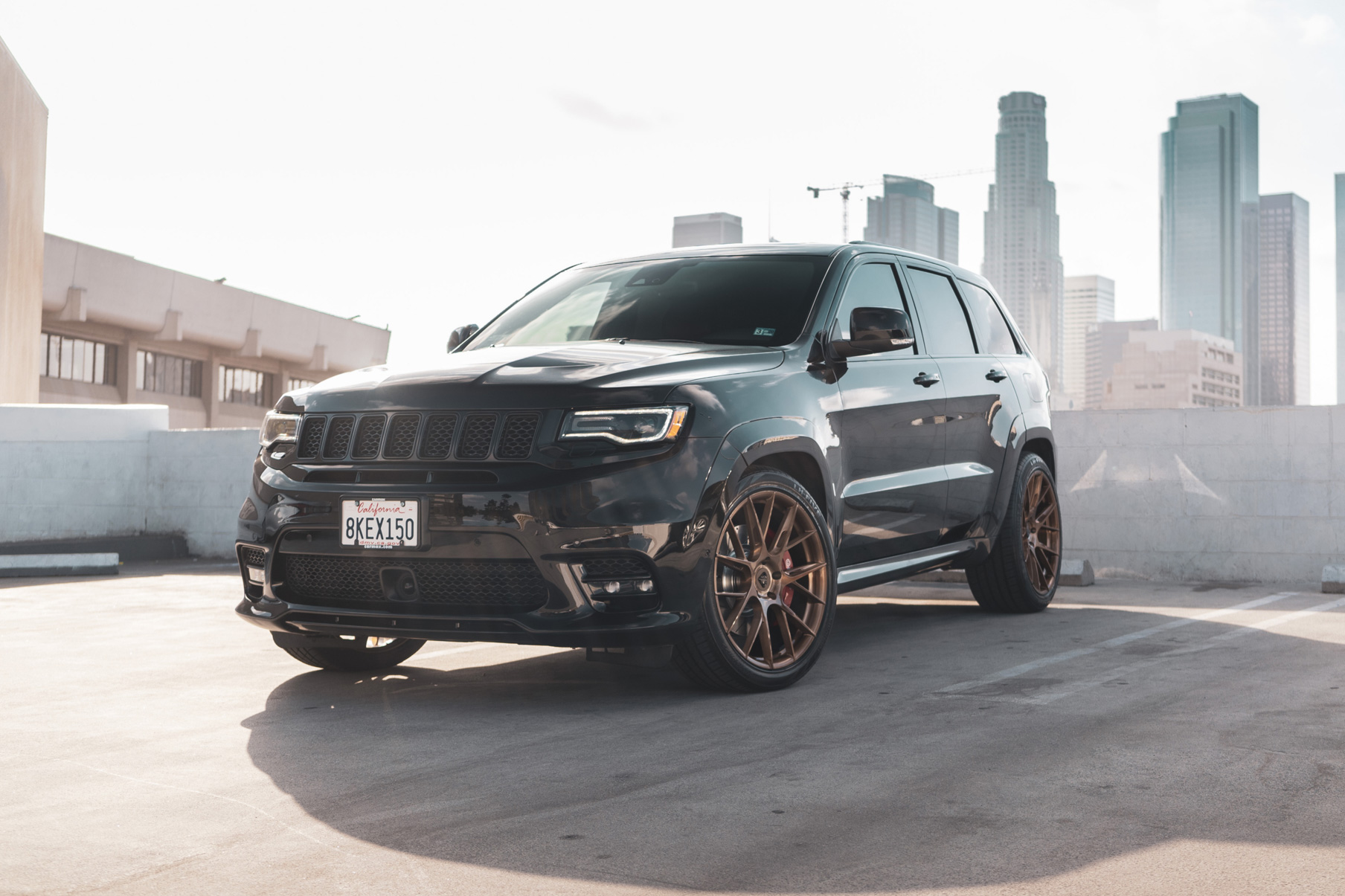 A 2020 Jeep SRT on 22 Inch Blaque Diamond Brushed Bronze Wheels