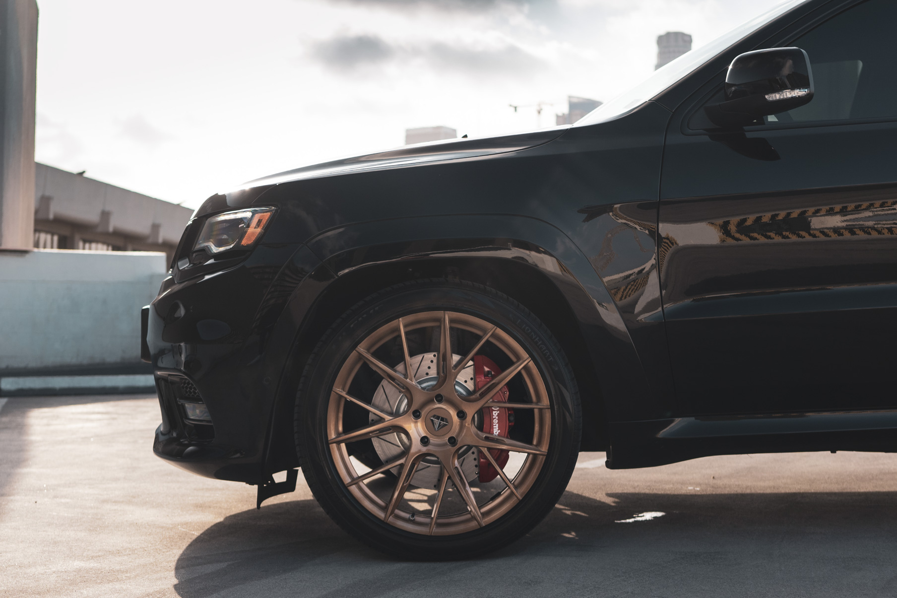 A 2020 Jeep SRT on 22 Inch Blaque Diamond Brushed Bronze Wheels