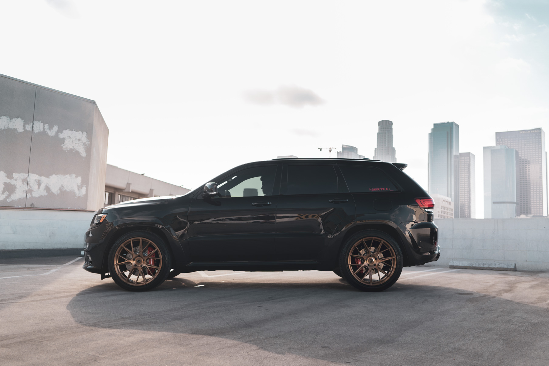 A 2020 Jeep SRT on 22 Inch Blaque Diamond Brushed Bronze Wheels