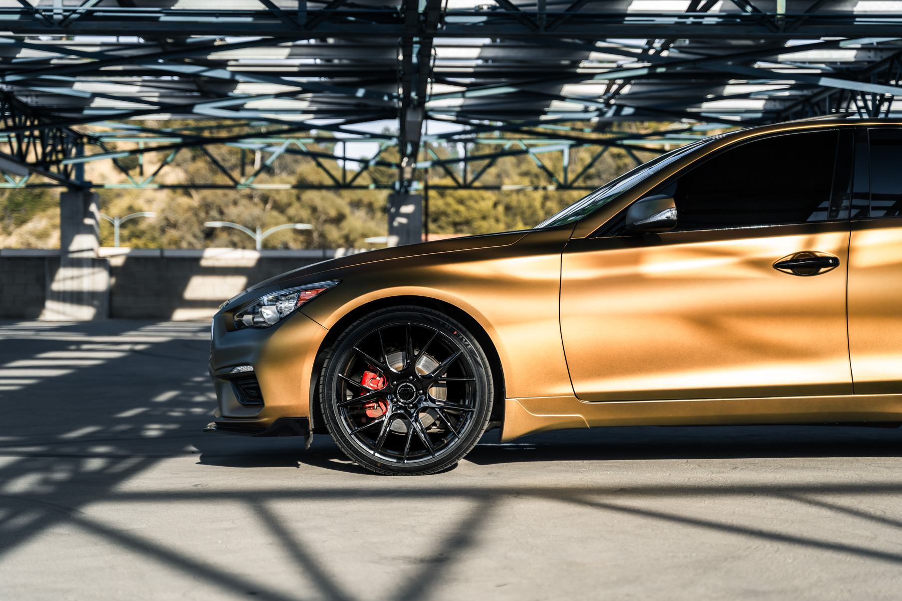 A Gold 2018 Infiniti Q50 on 20 Inch Blaque Diamond BD-F18 Gloss Black Wheels