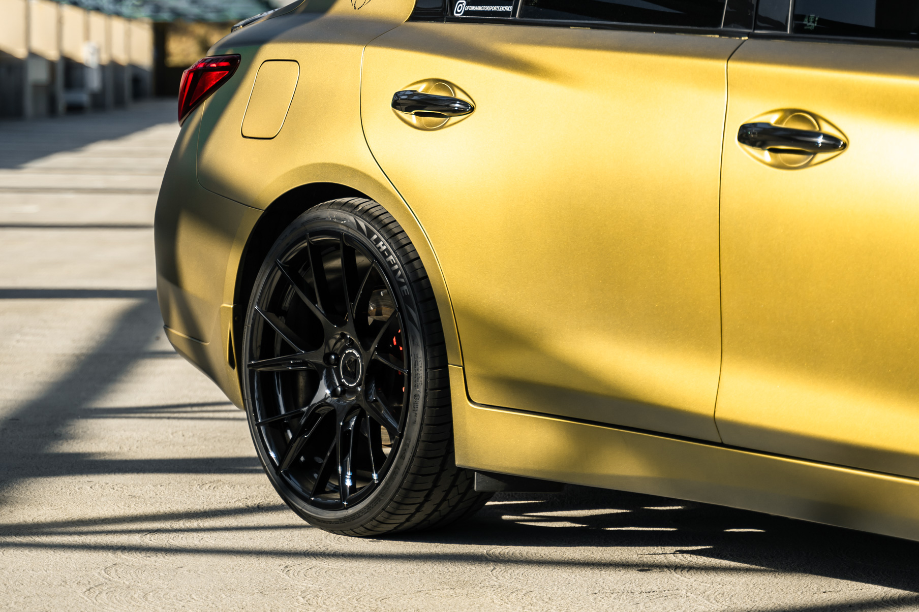 A Gold 2018 Infiniti Q50 on 20 Inch Blaque Diamond BD-F18 Gloss Black Wheels