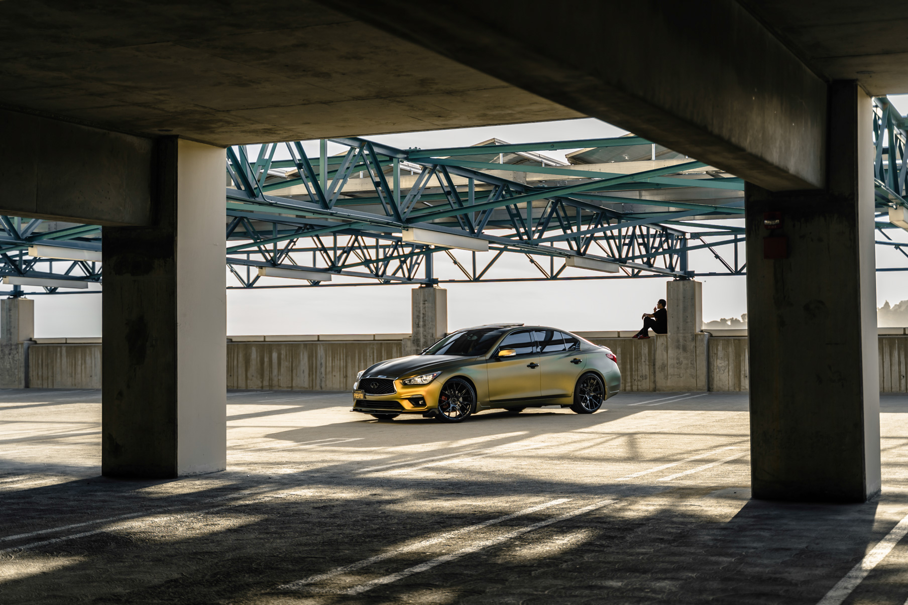 A Gold 2018 Infiniti Q50 on 20 Inch Blaque Diamond BD-F18 Gloss Black Wheels