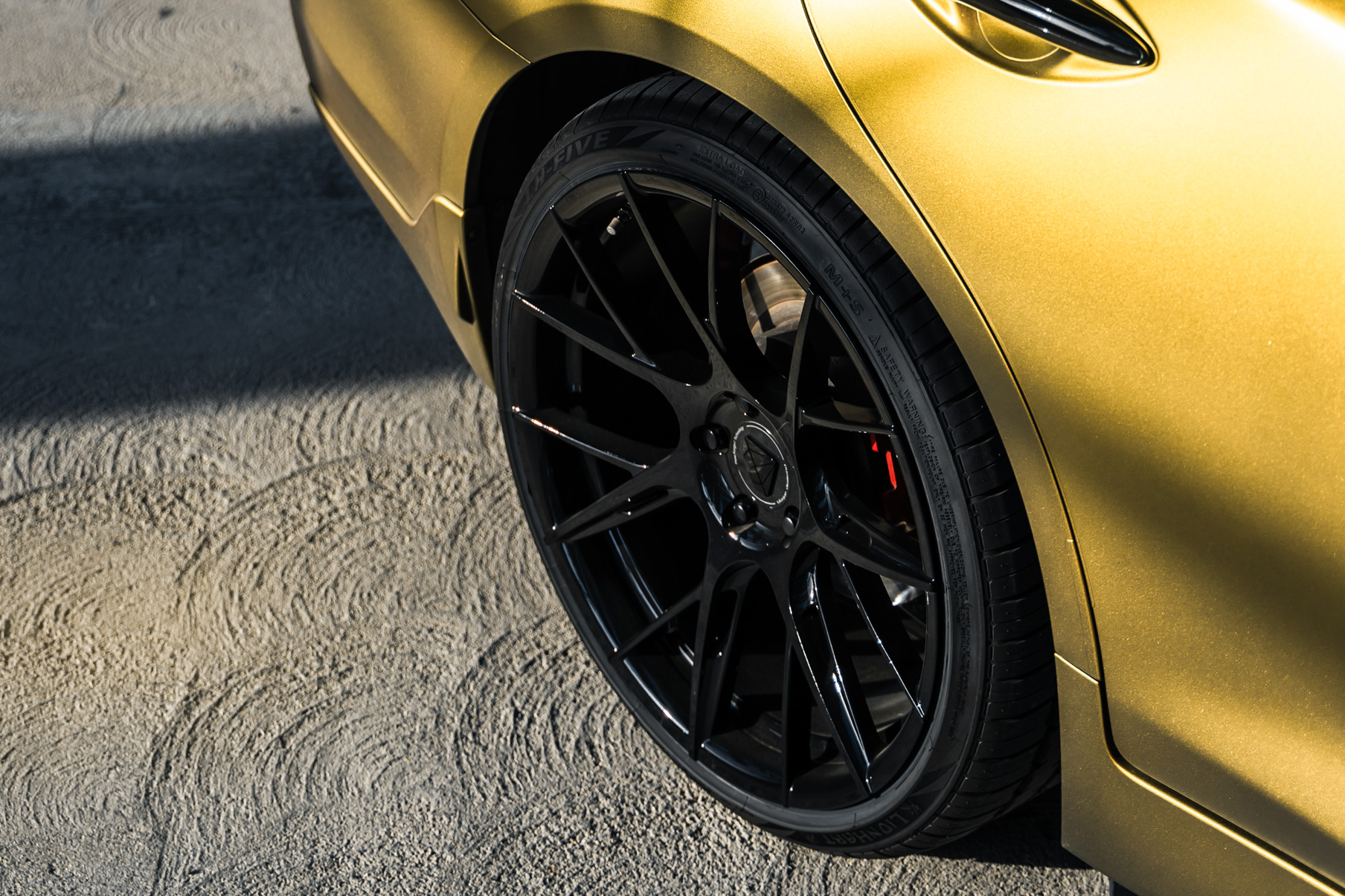 A Gold 2018 Infiniti Q50 on 20 Inch Blaque Diamond BD-F18 Gloss Black Wheels