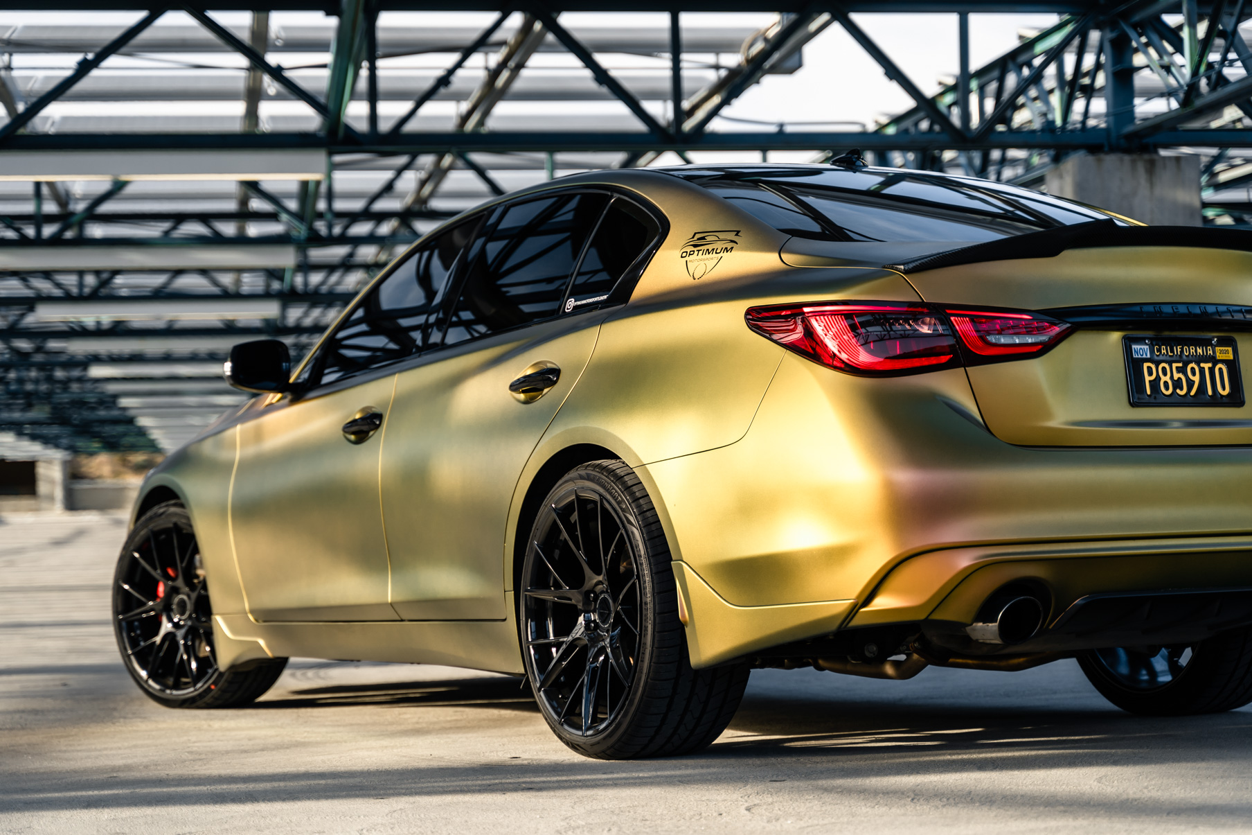 A Gold 2018 Infiniti Q50 on 20 Inch Blaque Diamond BD-F18 Gloss Black Wheels