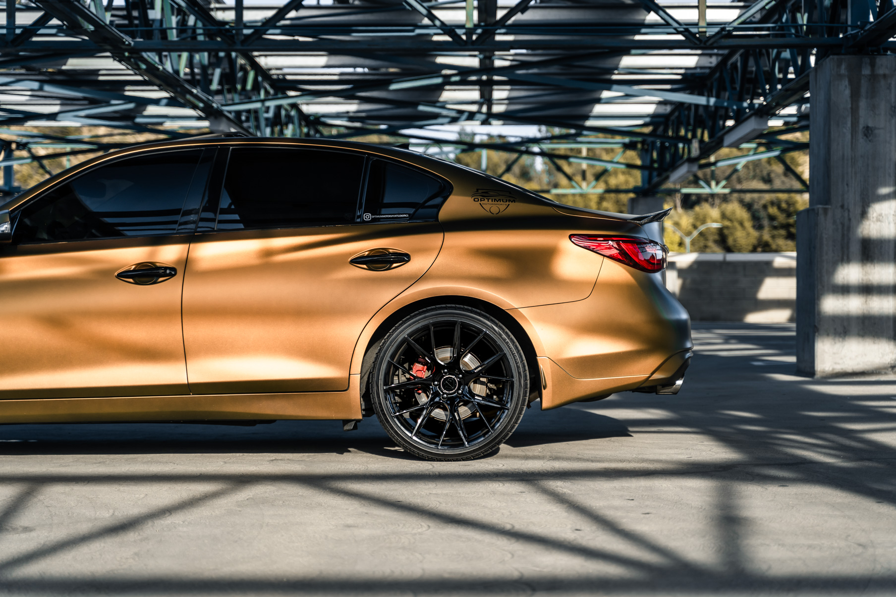 A Gold 2018 Infiniti Q50 on 20 Inch Blaque Diamond BD-F18 Gloss Black Wheels