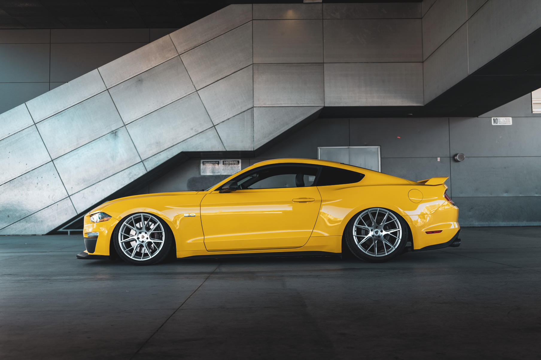 A 2018 Ford Mustang GT on 20 Inch Blaque Diamond BD-F18 Brushed Silver Wheels