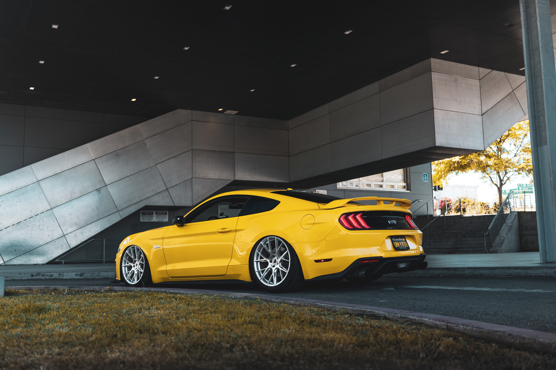 A 2018 Ford Mustang GT on 20 Inch Blaque Diamond BD-F18 Brushed Silver Wheels