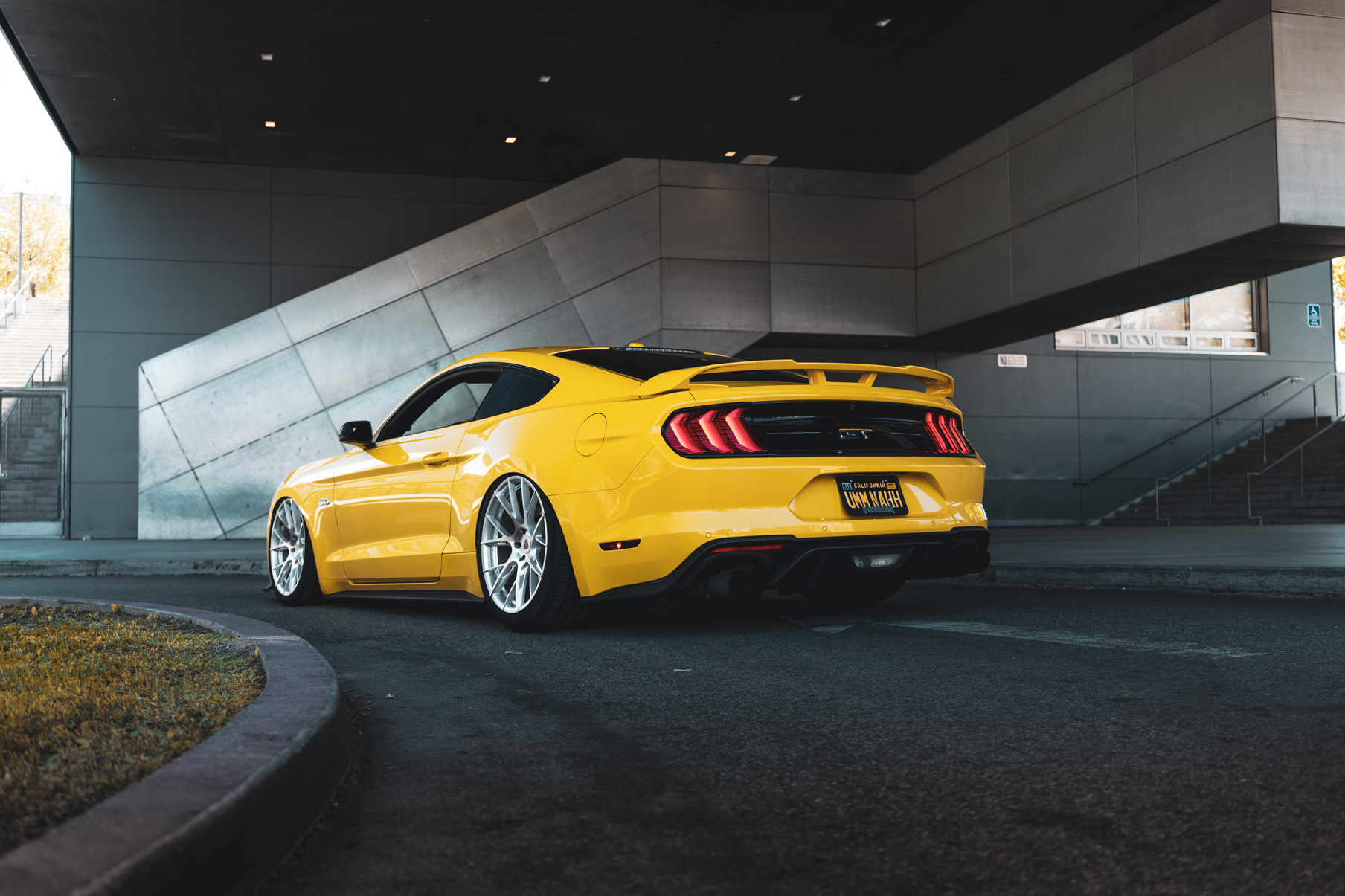 A 2018 Ford Mustang GT on 20 Inch Blaque Diamond BD-F18 Brushed Silver Wheels