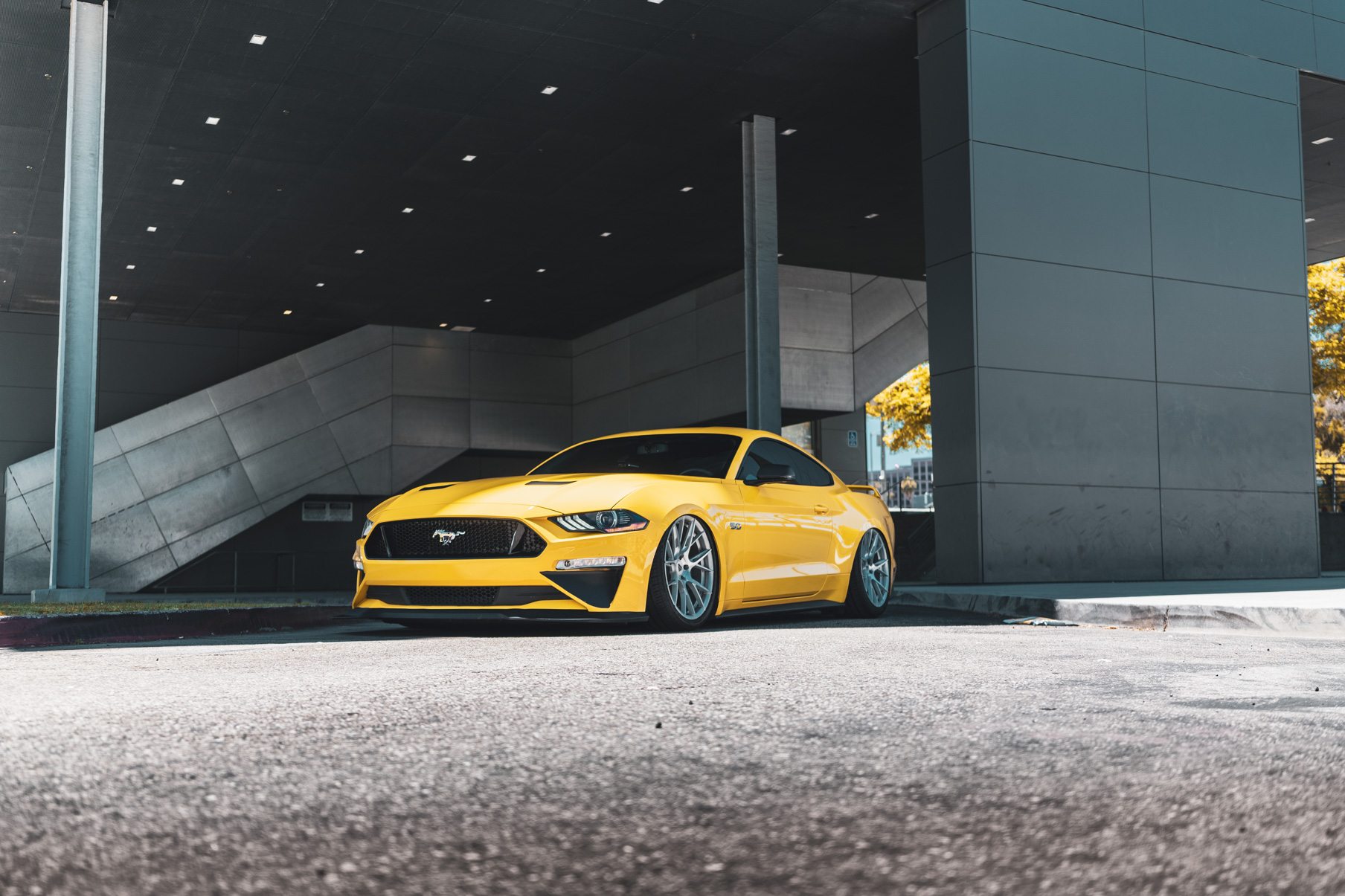 A 2018 Ford Mustang GT on 20 Inch Blaque Diamond BD-F18 Brushed Silver Wheels