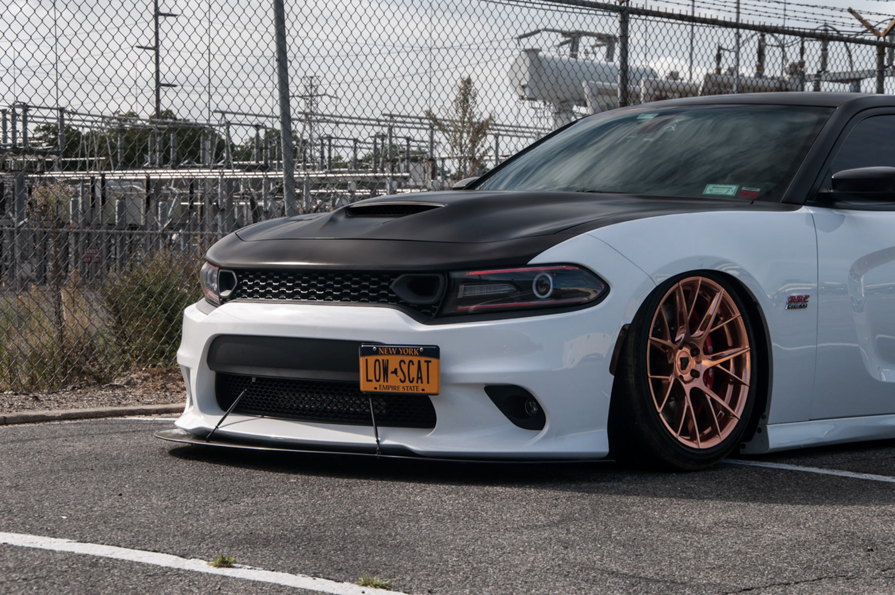A 2018 Dodge Charger on 20 Inch Blaque Diamond BD-F18 Custom Polished Rose Gold Wheels