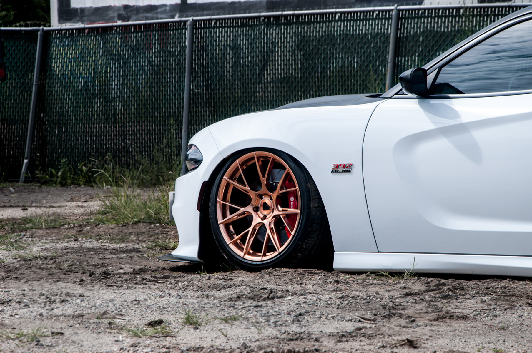 A 2018 Dodge Charger on 20 Inch Blaque Diamond BD-F18 Custom Polished Rose Gold Wheels