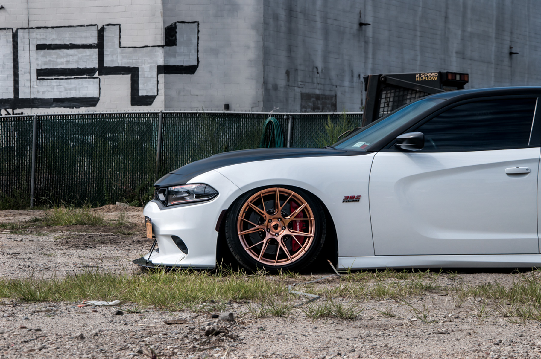 A 2018 Dodge Charger on 20 Inch Blaque Diamond BD-F18 Custom Polished Rose Gold Wheels
