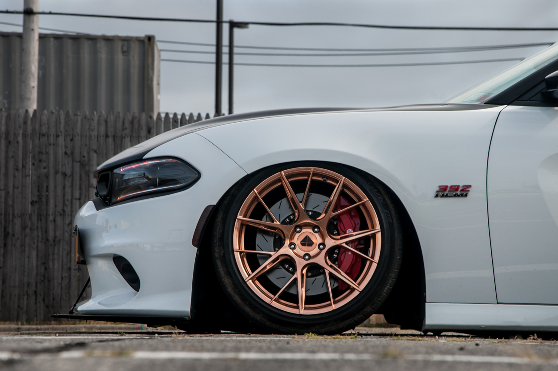 A 2018 Dodge Charger on 20 Inch Blaque Diamond BD-F18 Custom Polished Rose Gold Wheels