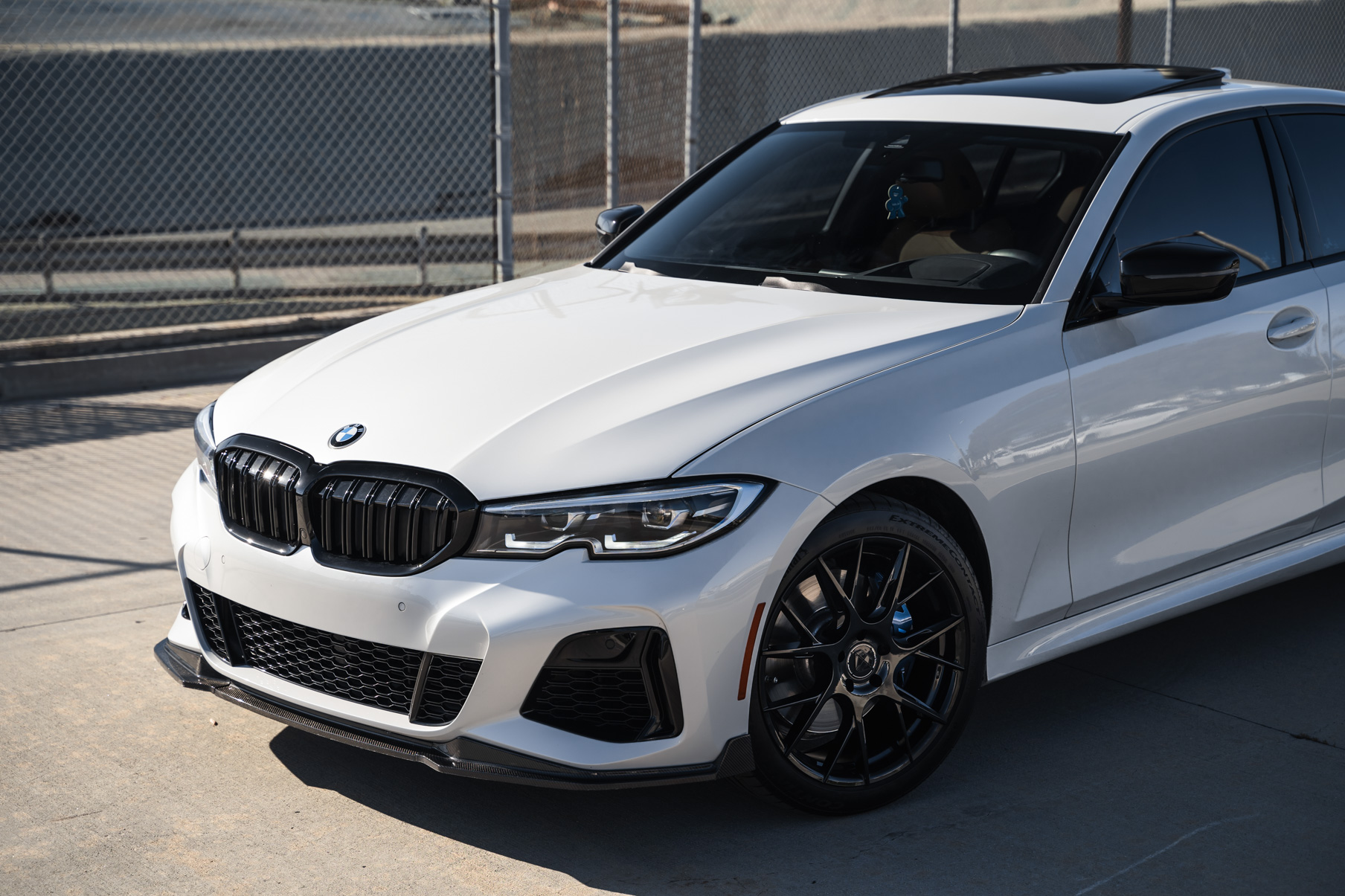 A 2021 BMW M340i on 20 Inch Blaque Diamond BD-F18 Gloss Black Wheels