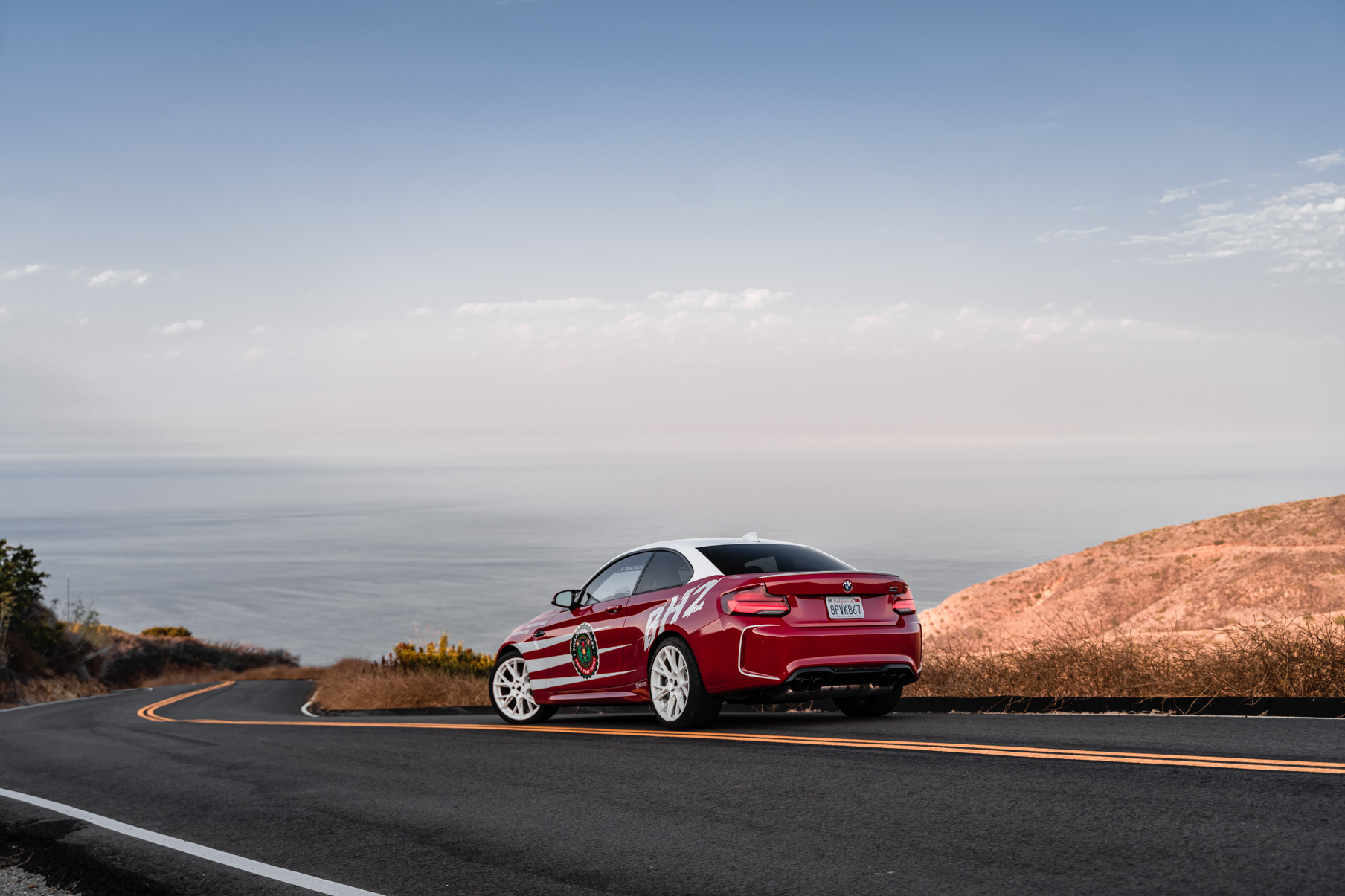 A 2020 BMW M2 on 20 Inch Blaque Diamond BD-F18 Gloss White Wheels
