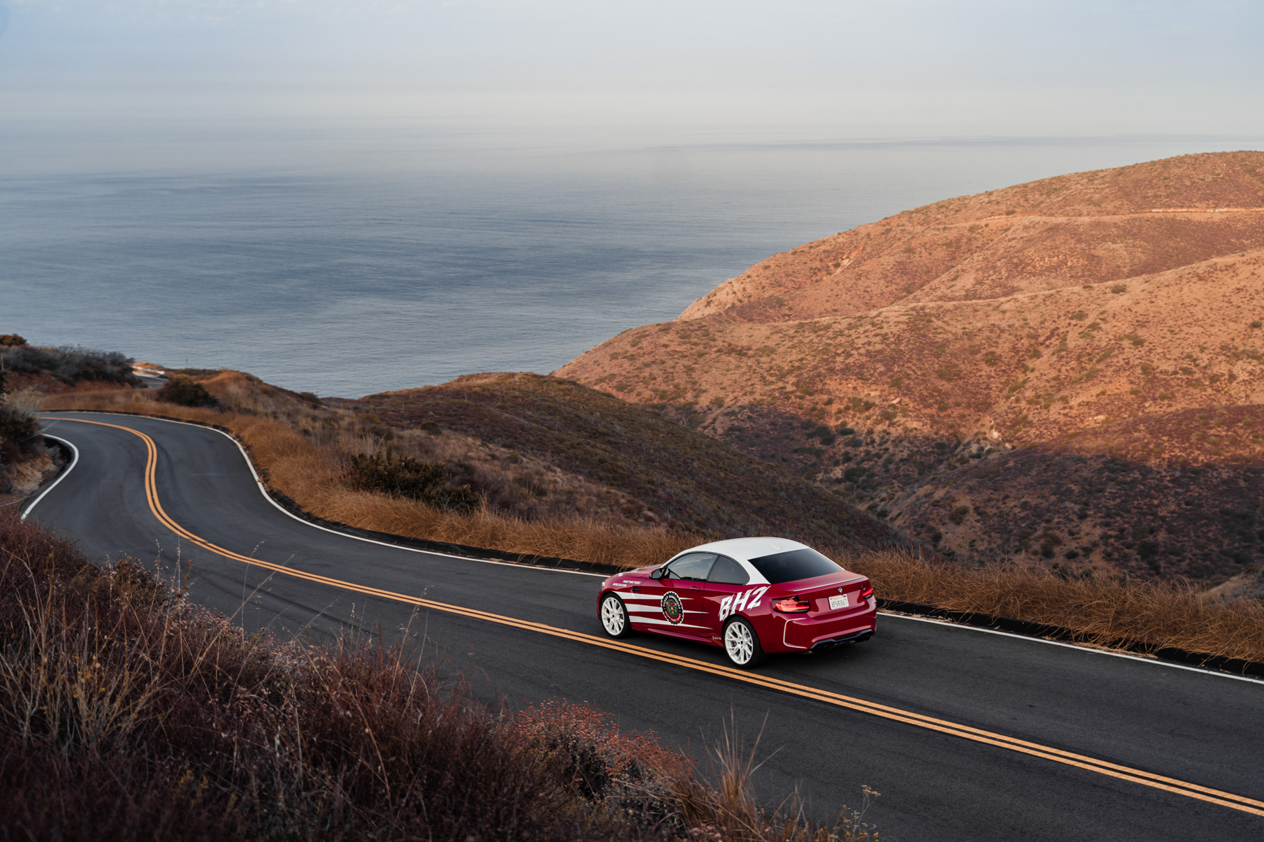 A 2020 BMW M2 on 20 Inch Blaque Diamond BD-F18 Gloss White Wheels