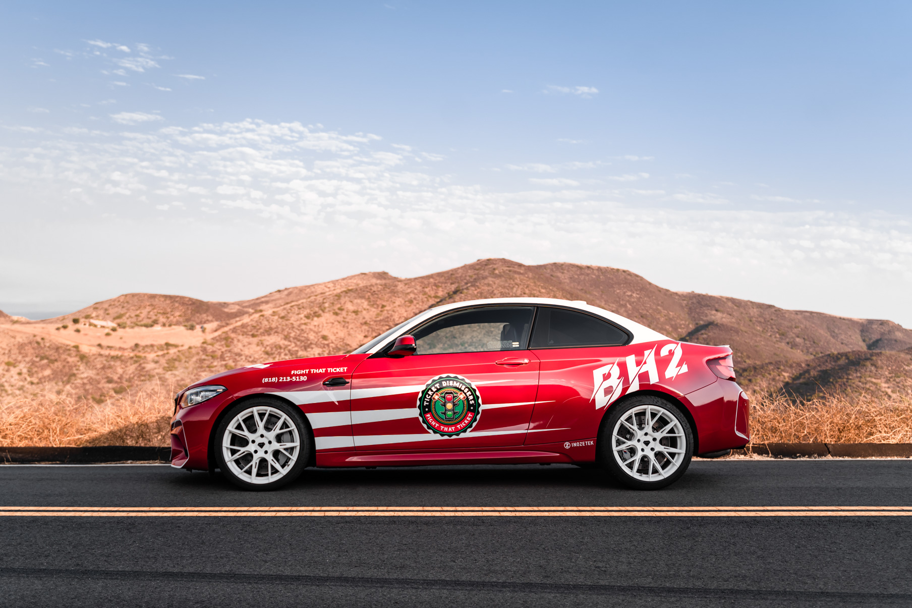 A 2020 BMW M2 on 20 Inch Blaque Diamond BD-F18 Gloss White Wheels