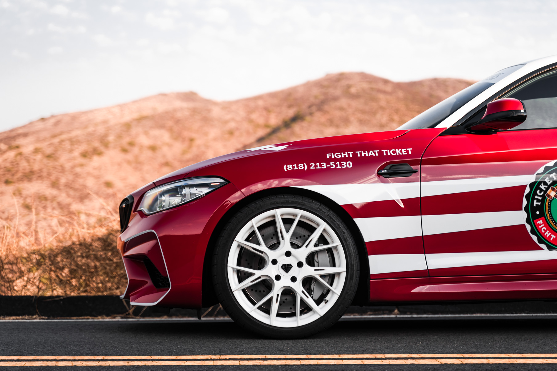 A 2020 BMW M2 on 20 Inch Blaque Diamond BD-F18 Gloss White Wheels