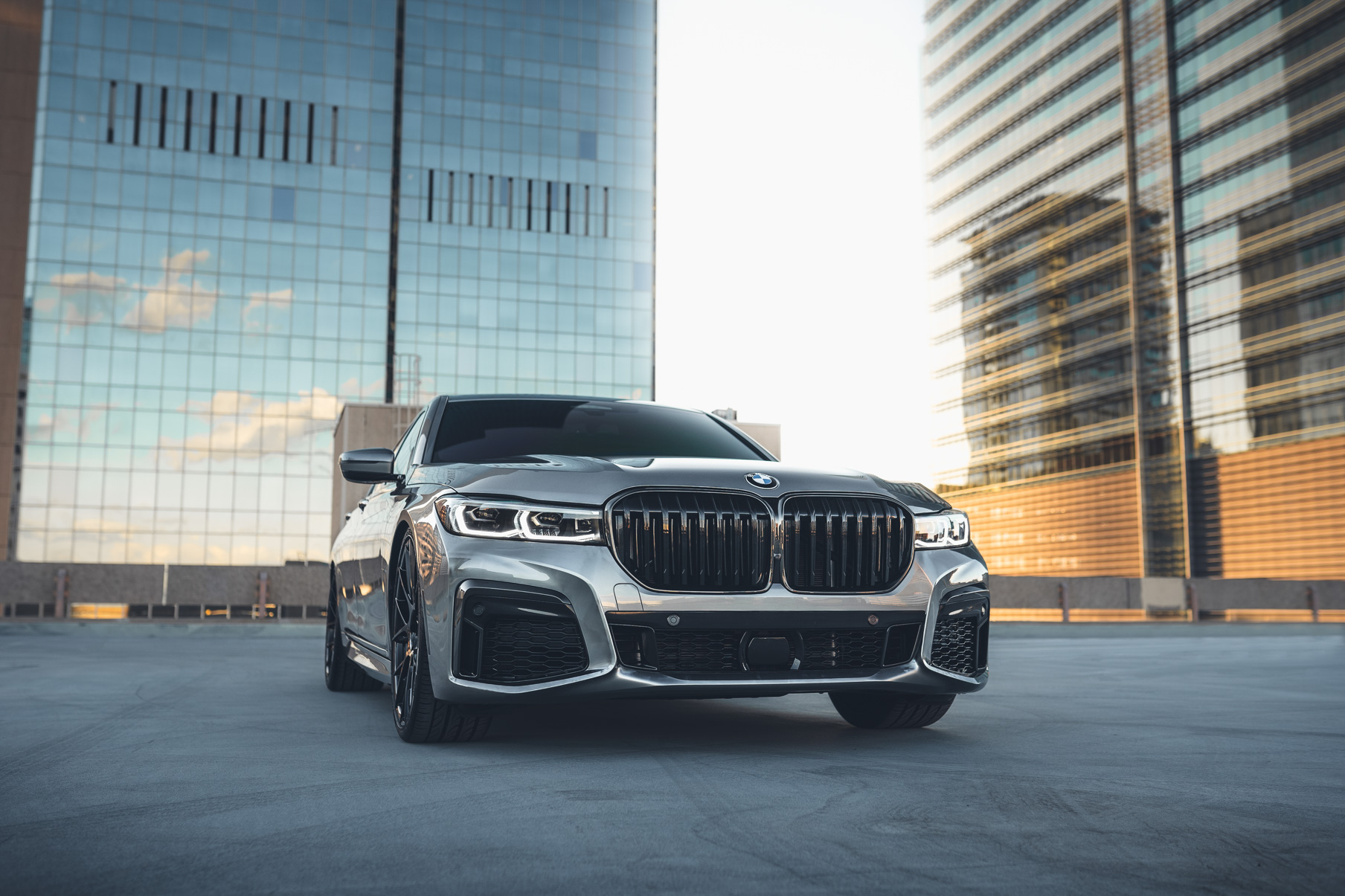 A 2020 BMW 750i on 20 Inch Blaque Diamond BD-F18 Gloss Black Wheels