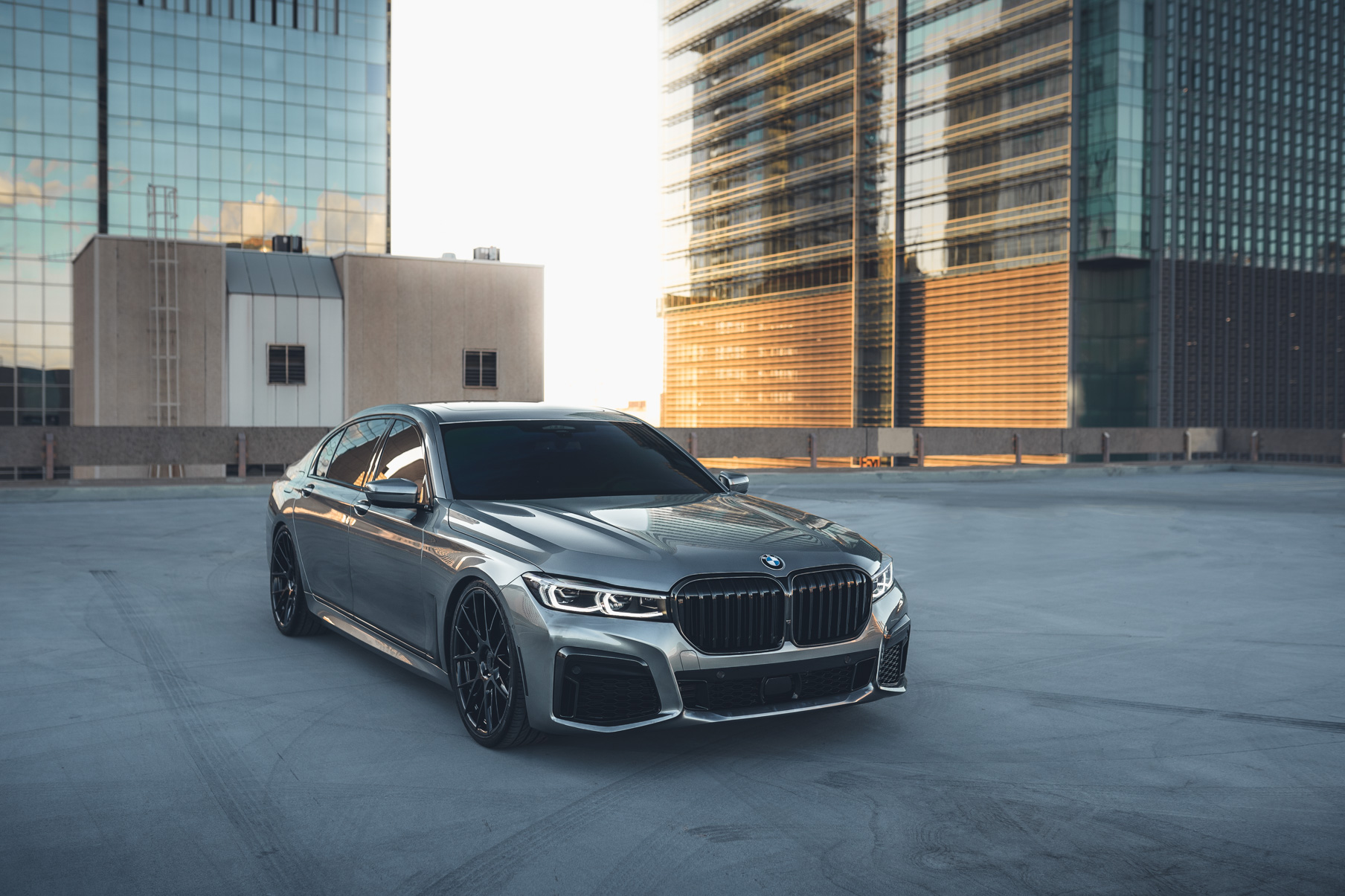 A 2020 BMW 750i on 20 Inch Blaque Diamond BD-F18 Gloss Black Wheels
