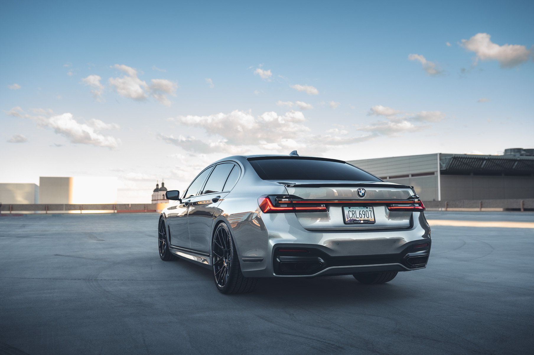 A 2020 BMW 750i on 20 Inch Blaque Diamond BD-F18 Gloss Black Wheels