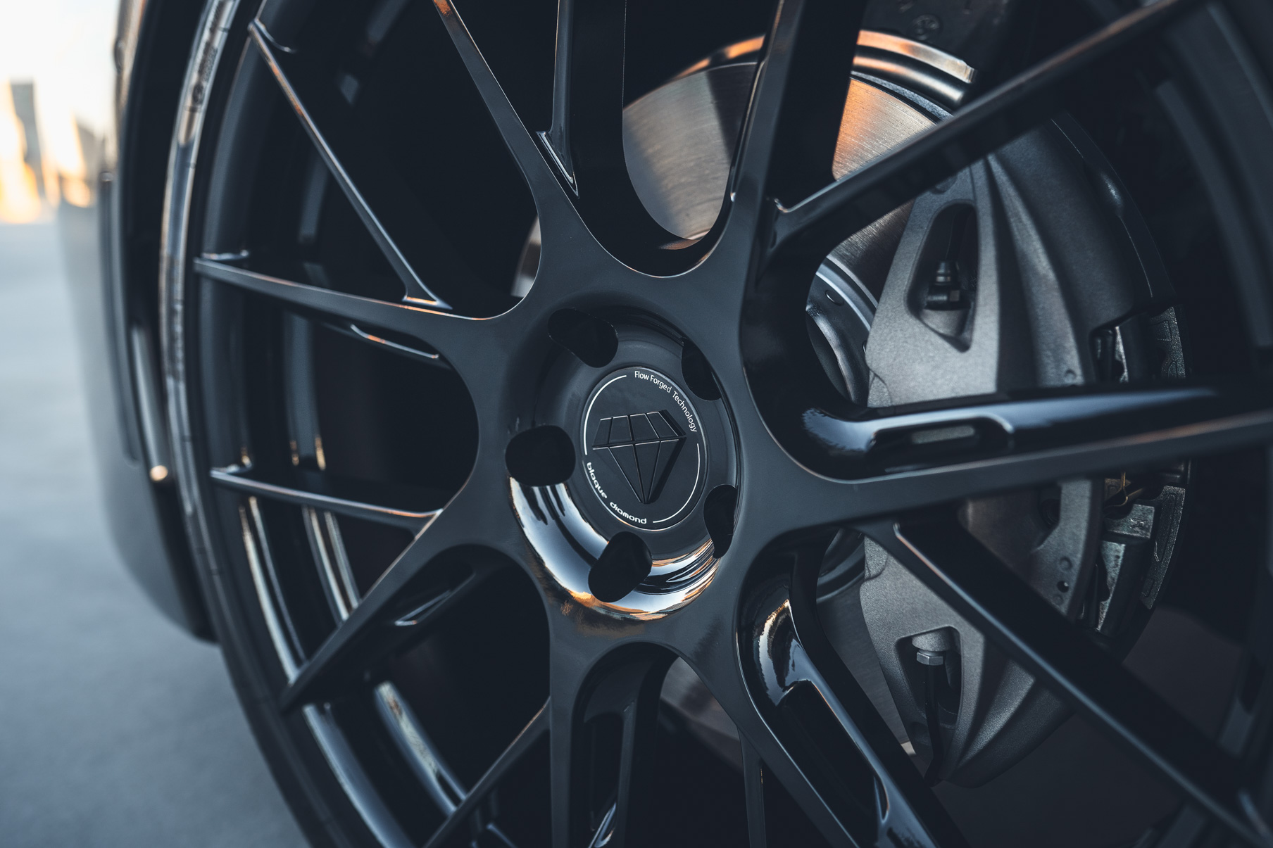 A 2020 BMW 750i on 20 Inch Blaque Diamond BD-F18 Gloss Black Wheels