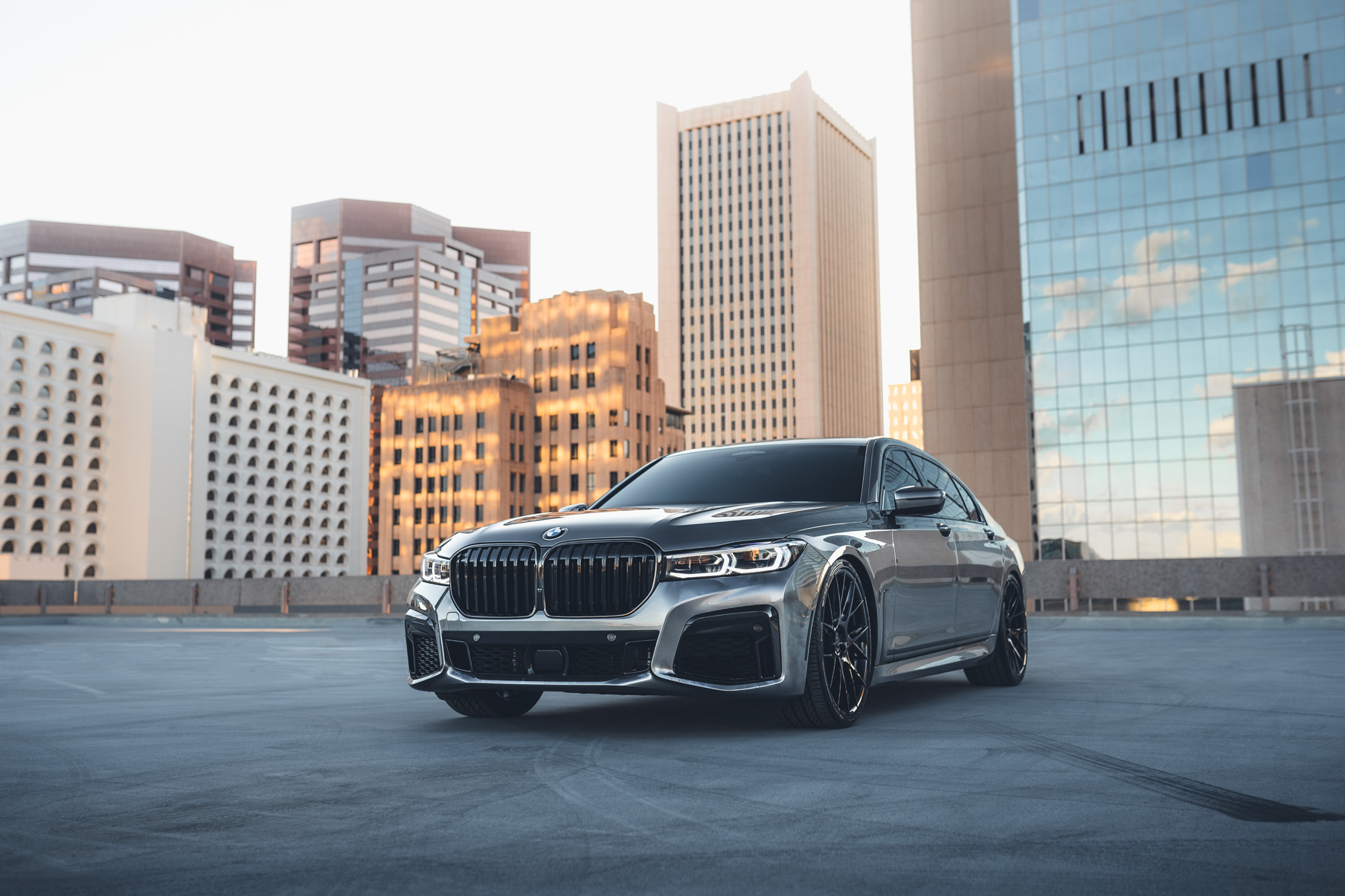 A 2020 BMW 750i on 20 Inch Blaque Diamond BD-F18 Gloss Black Wheels